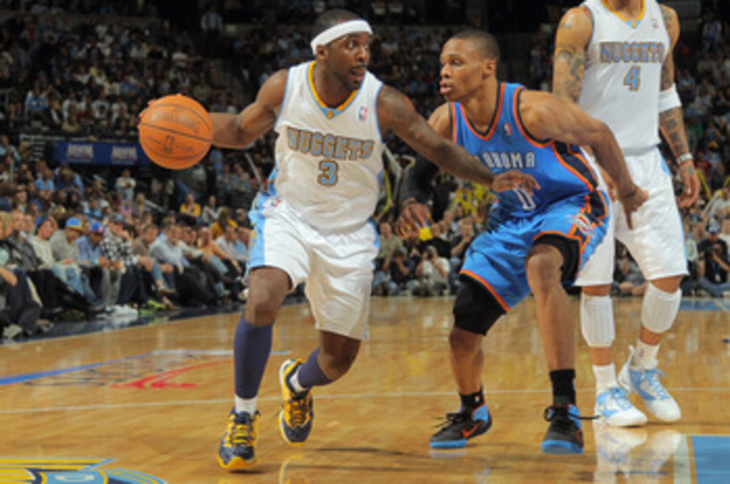 DENVER, CO - APRIL 25:  Ty Lawson #3 of the Denver Nuggets dribbes the ball against Russell Westbrook #0 of the Oklahoma City Thunder in Game Four of the Western Conference Quarterfinals in the 2011 NBA Playoffs on April 24, 2011 at the Pepsi Center in De