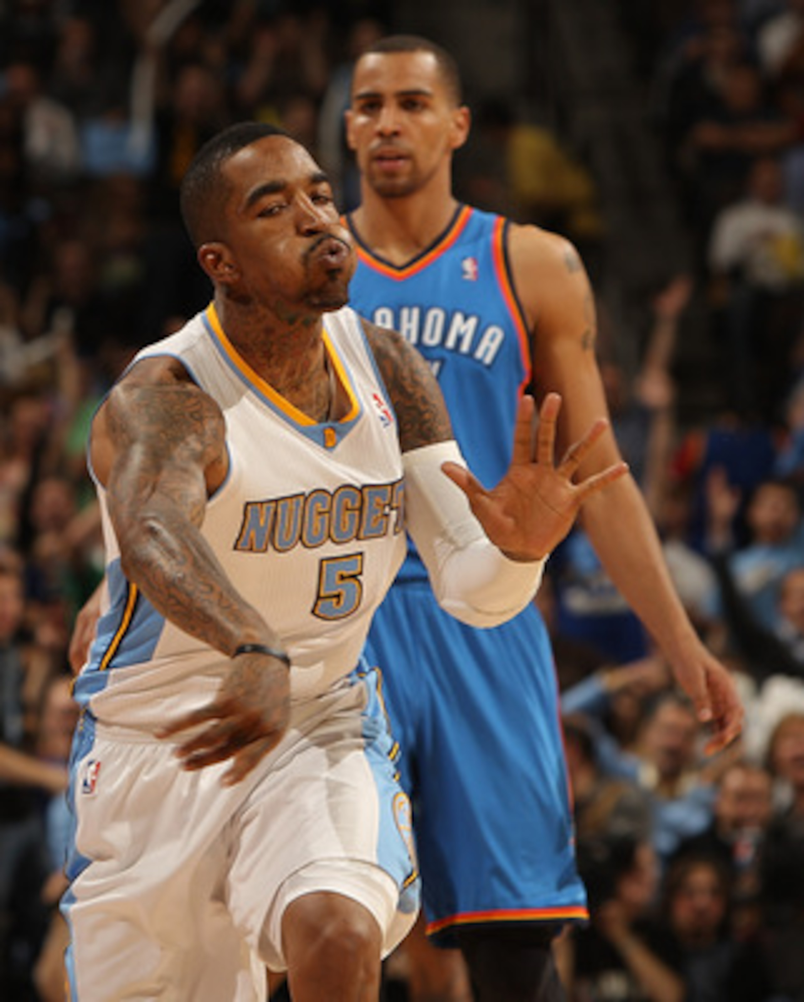 DENVER, CO - APRIL 25: J.R. Smith #5 of the Denver Nuggets celebrates after hitting a three point basket against the Oklahoma City Thunder in Game Four of the Western Conference Quarterfinals in the 2011 NBA Playoffs at Pepsi Center on April 25, 2011 in DENVER, CO - APRIL 25: J.R. Smith #5 of the Denver Nuggets celebrates after hitting a three point basket against the Oklahoma City Thunder in Game Four of the Western Conference Quarterfinals in the 2011 NBA Playoffs at Pepsi Center on April 25, 2011 in