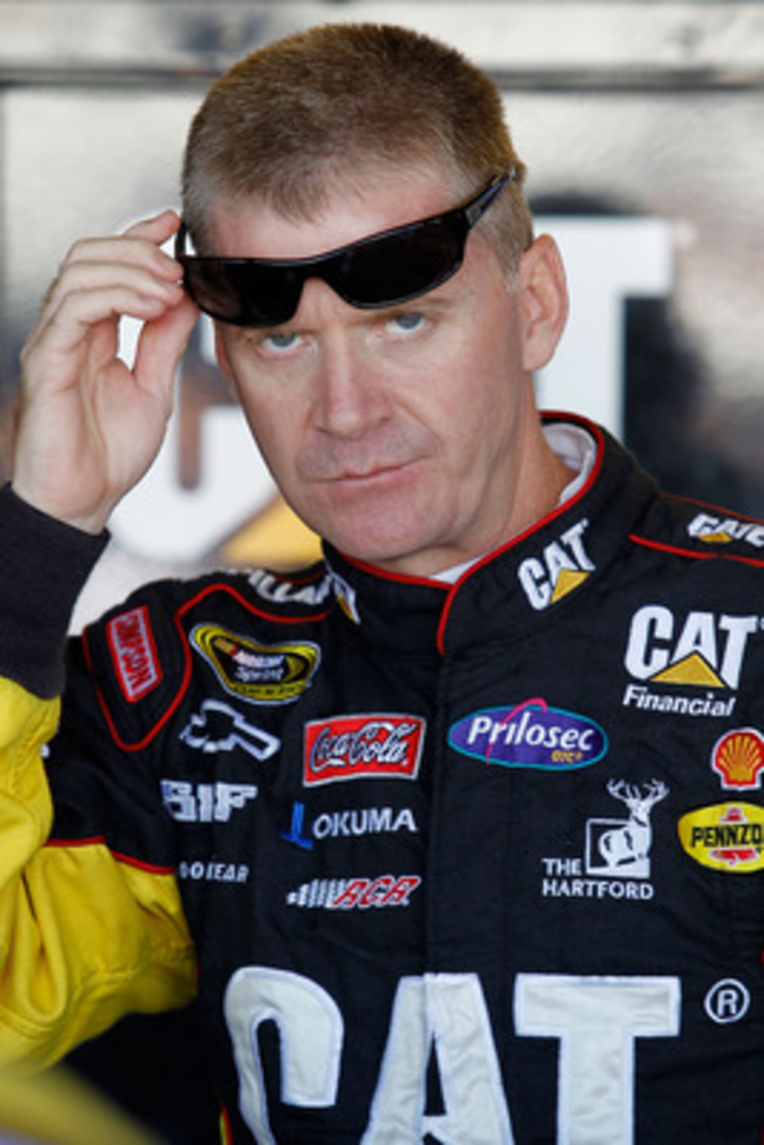 RICHMOND, VA - SEPTEMBER 10:  Jeff Burton, driver of the #31 Caterpilliar Chevrolet, stands in the garage during practice for the NASCAR Sprint Cup Series Air Guard 400 at Richmond International Raceway on September 10, 2010 in Richmond, Virginia.  (Photo