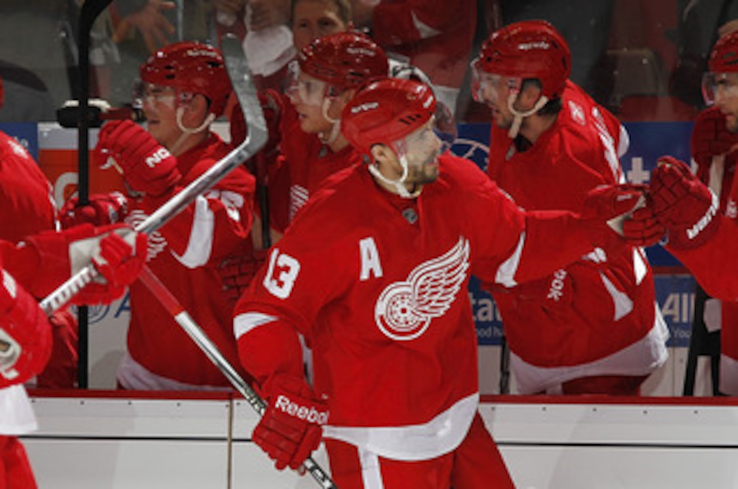 DETROIT, MI - APRIL 16: Pavel Datsyuk #13 of the Detroit Red Wings is congratulated by teammates while playing the Phoenix Coyotes in Game Two of the Western Conference Quarterfinals during the 2011 Stanley Cup Playoffs at Joe Louis Arena on April 16, 201