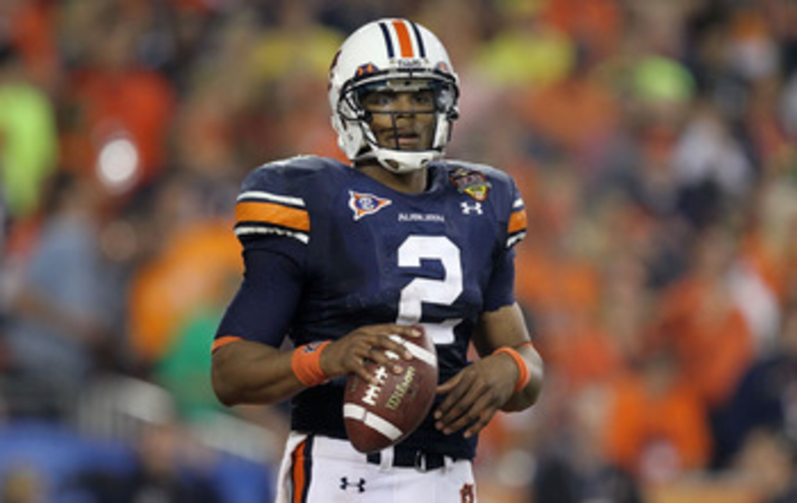 GLENDALE, AZ - JANUARY 10:  Cameron Newton #2 of the Auburn Tigers looks on against the Oregon Ducks during the Tostitos BCS National Championship Game at University of Phoenix Stadium on January 10, 2011 in Glendale, Arizona.  (Photo by Ronald Martinez/G