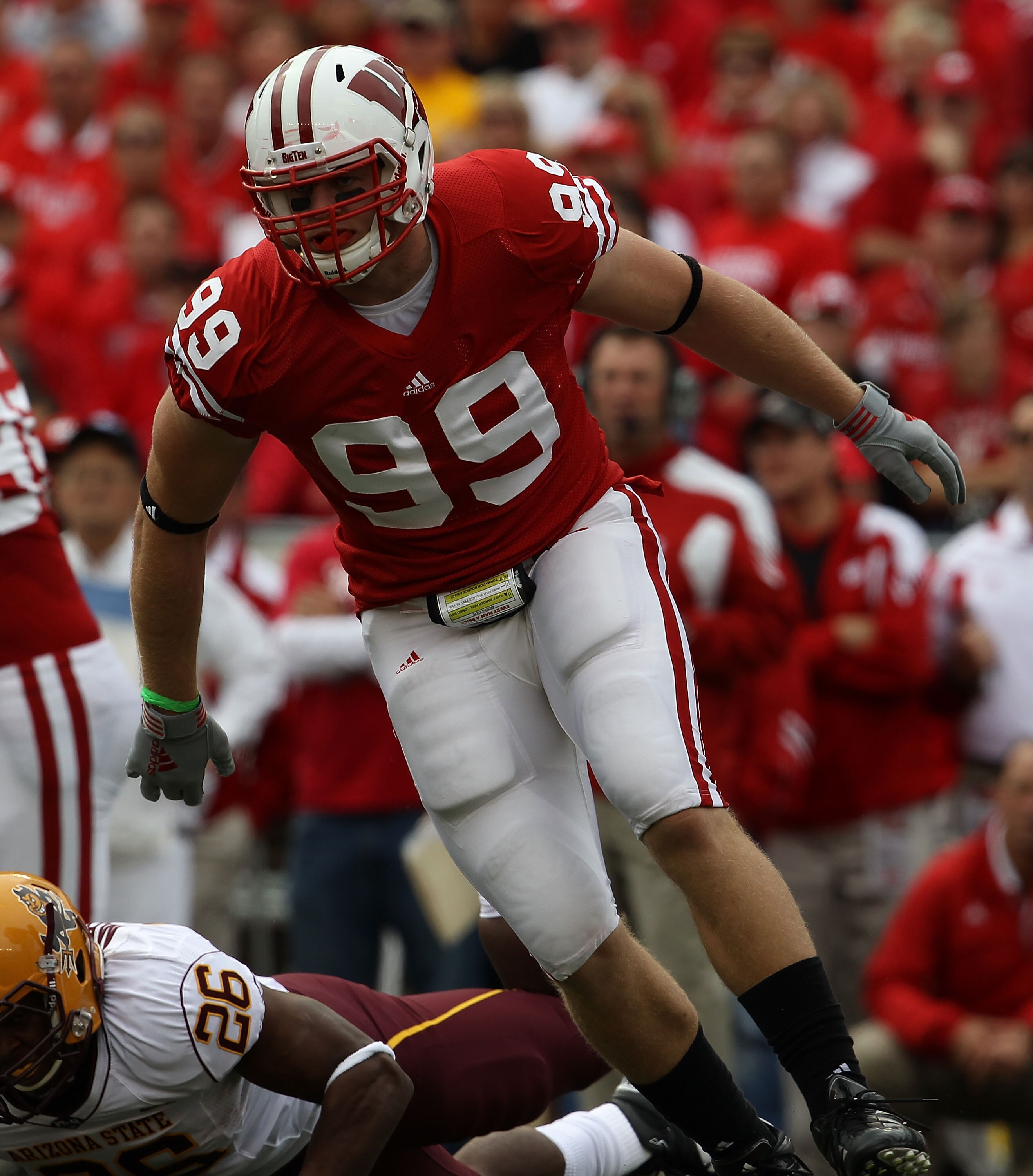 MADISON, WI - SEPTEMBER 18: J.J. Watt #99 of the Wisconsin Badgers rushes against the Arizona State Sun Devils at Camp Randall Stadium on September 18, 2010 in Madison, Wisconsin. Wisconsin defeated Arizona State 20-19. Wisconsin defeated Arizona State 20 MADISON, WI - SEPTEMBER 18: J.J. Watt #99 of the Wisconsin Badgers rushes against the Arizona State Sun Devils at Camp Randall Stadium on September 18, 2010 in Madison, Wisconsin. Wisconsin defeated Arizona State 20-19. Wisconsin defeated Arizona State 20