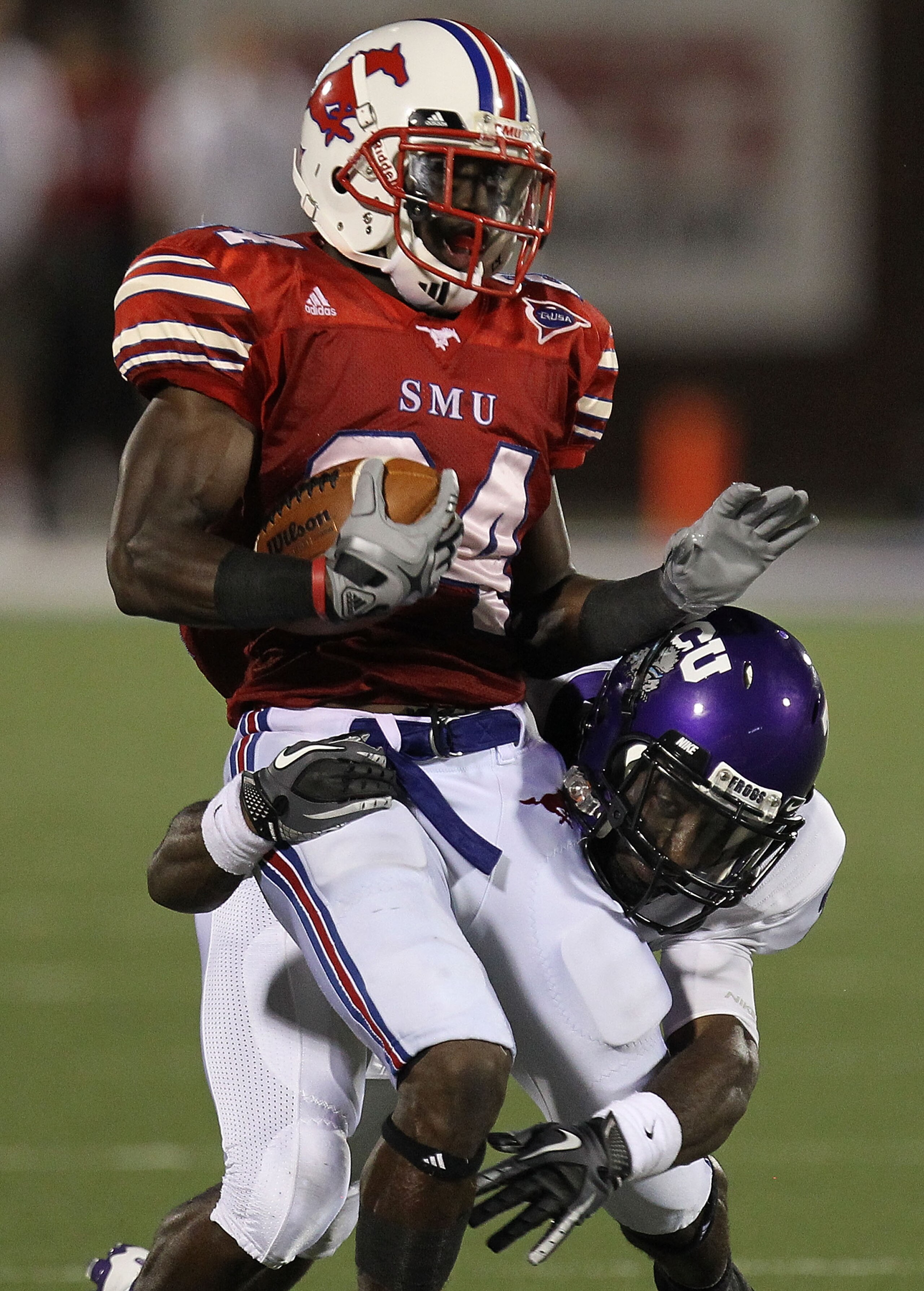 DALLAS - SEPTEMBER 24: Wide receiver Aldrick Robinson #24 of the SMU Mustangs is tackled by Greg McCoy #7 of the TCU Horned Frogs at Gerald J. Ford Stadium on September 24, 2010 in Dallas, Texas. (Photo by Ronald Martinez/Getty Images) DALLAS - SEPTEMBER 24: Wide receiver Aldrick Robinson #24 of the SMU Mustangs is tackled by Greg McCoy #7 of the TCU Horned Frogs at Gerald J. Ford Stadium on September 24, 2010 in Dallas, Texas. (Photo by Ronald Martinez/Getty Images)