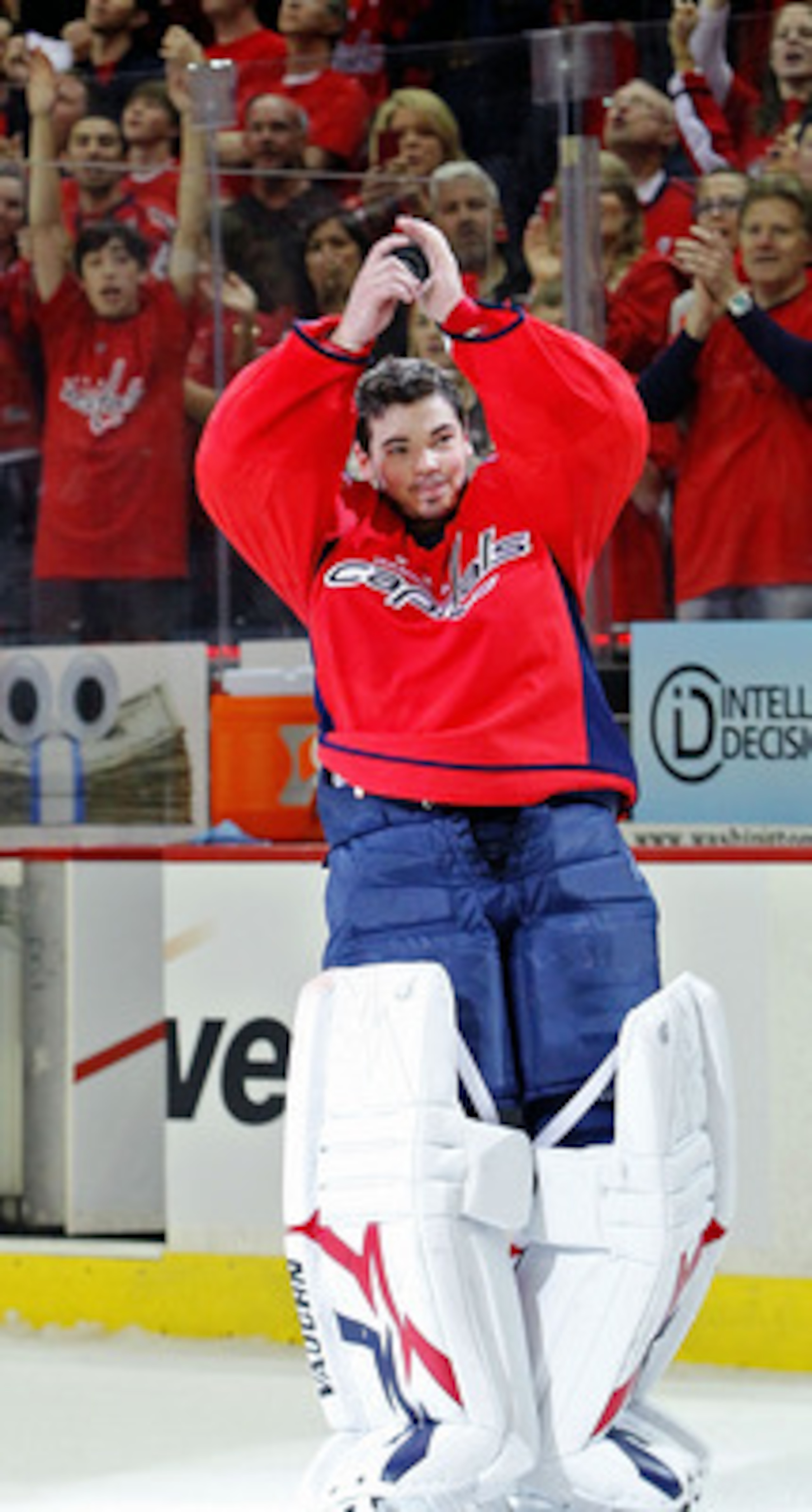 WASHINGTON , DC - APRIL 23:  Michal Neuvirth #30 of the Washington Capitals celebrates being named the first star of the game against the New York Rangers in Game Five of the Eastern Conference Quarterfinals during the 2011 NHL Stanley Cup Playoffs at the