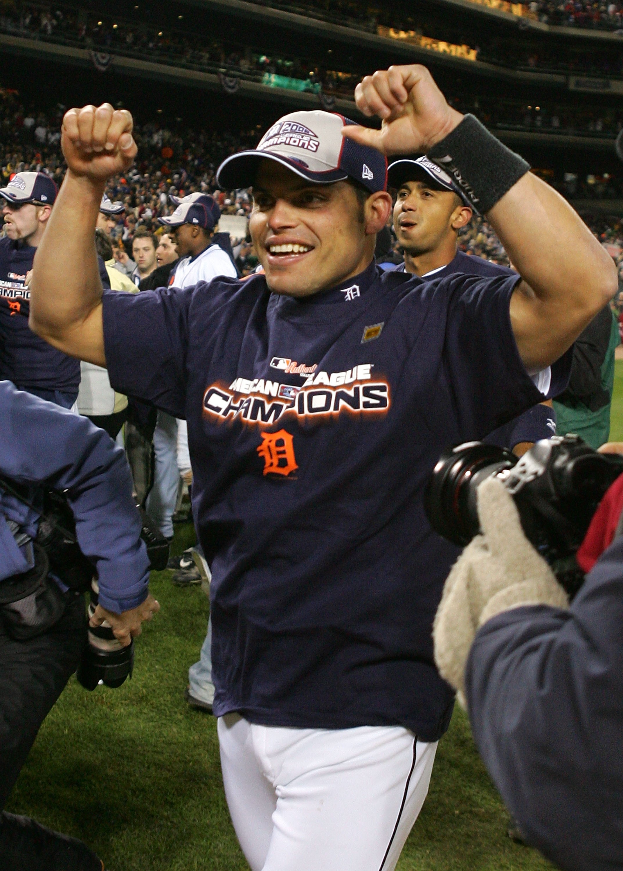 Detroit Tigers' Ivan Rodriguez, left, celebrates with Placido