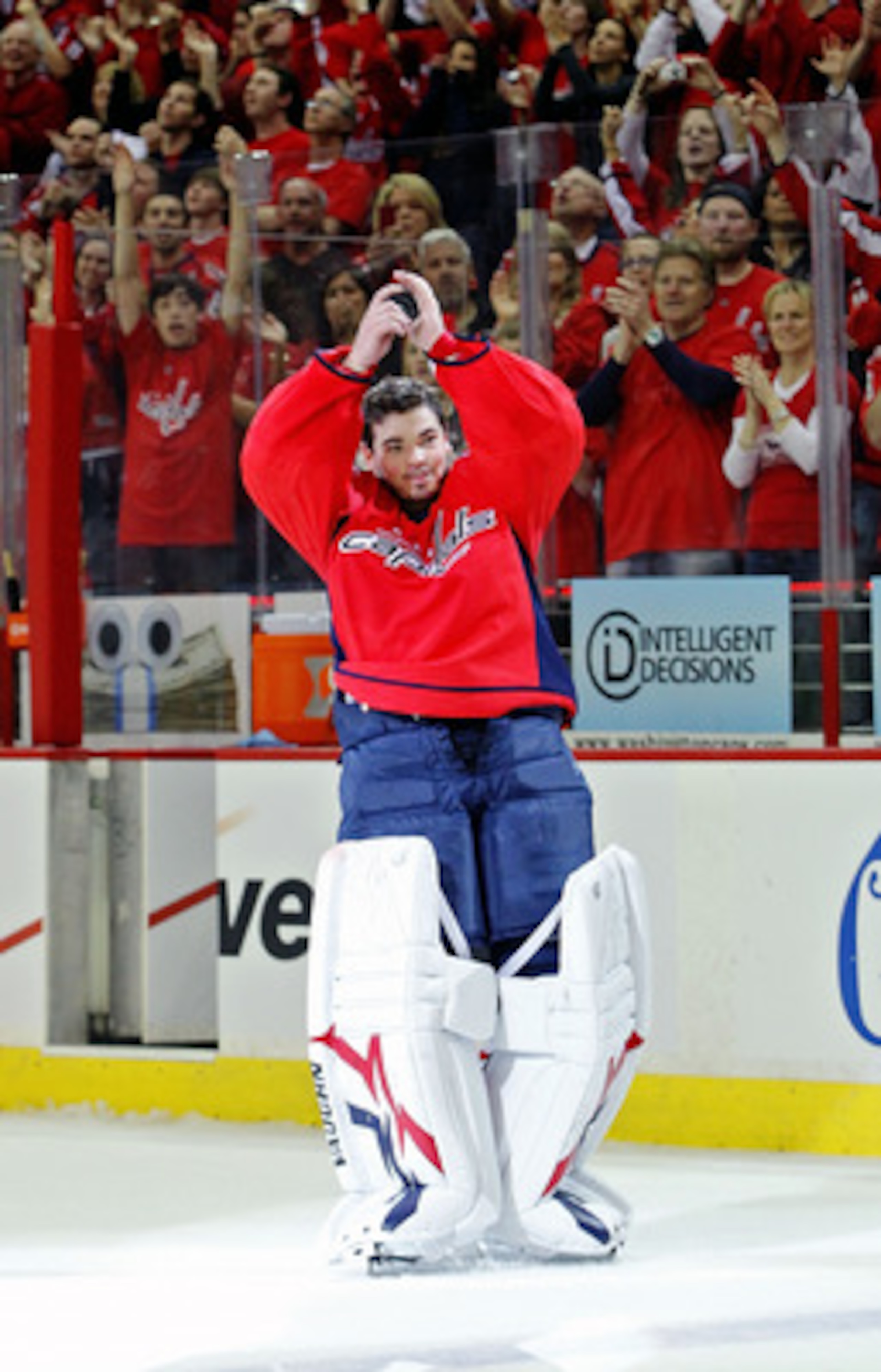WASHINGTON , DC - APRIL 23:  Michal Neuvirth #30 of the Washington Capitals celebrates being named the first star of the game against the New York Rangers in Game Five of the Eastern Conference Quarterfinals during the 2011 NHL Stanley Cup Playoffs at the