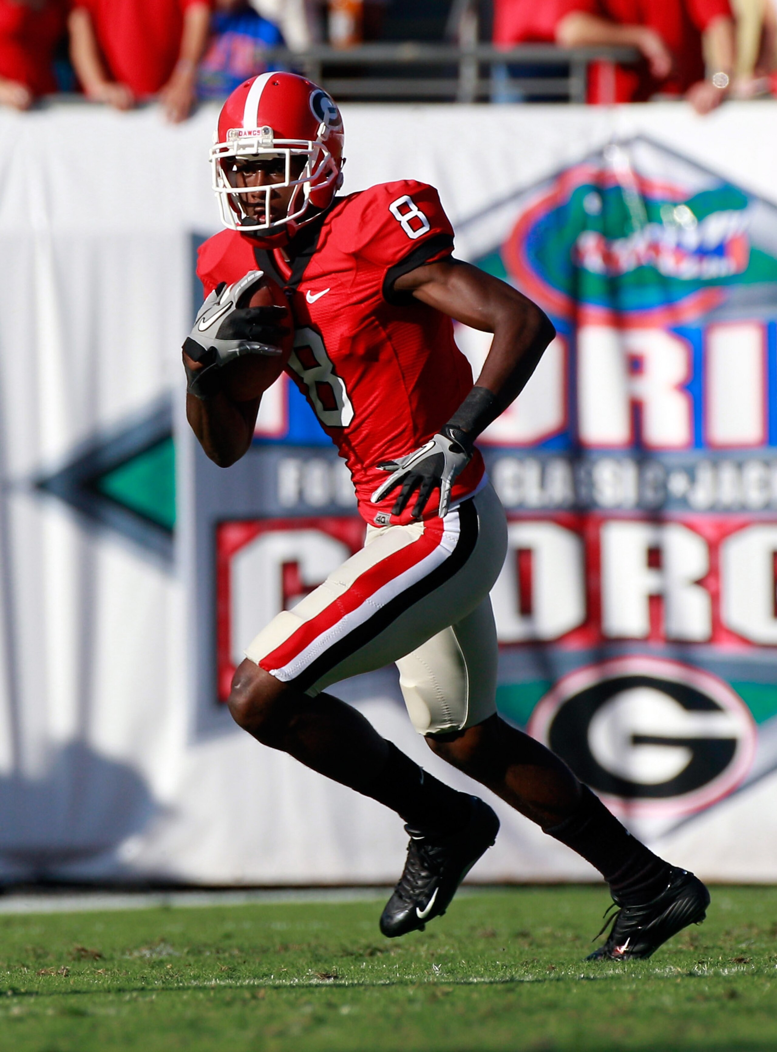 JACKSONVILLE, FL - OCTOBER 30: A.J. Green #8 of the Georgia Bulldogs runs for yardage during the game against the Florida Gators at EverBank Field on October 30, 2010 in Jacksonville, Florida. (Photo by Sam Greenwood/Getty Images) JACKSONVILLE, FL - OCTOBER 30: A.J. Green #8 of the Georgia Bulldogs runs for yardage during the game against the Florida Gators at EverBank Field on October 30, 2010 in Jacksonville, Florida. (Photo by Sam Greenwood/Getty Images)