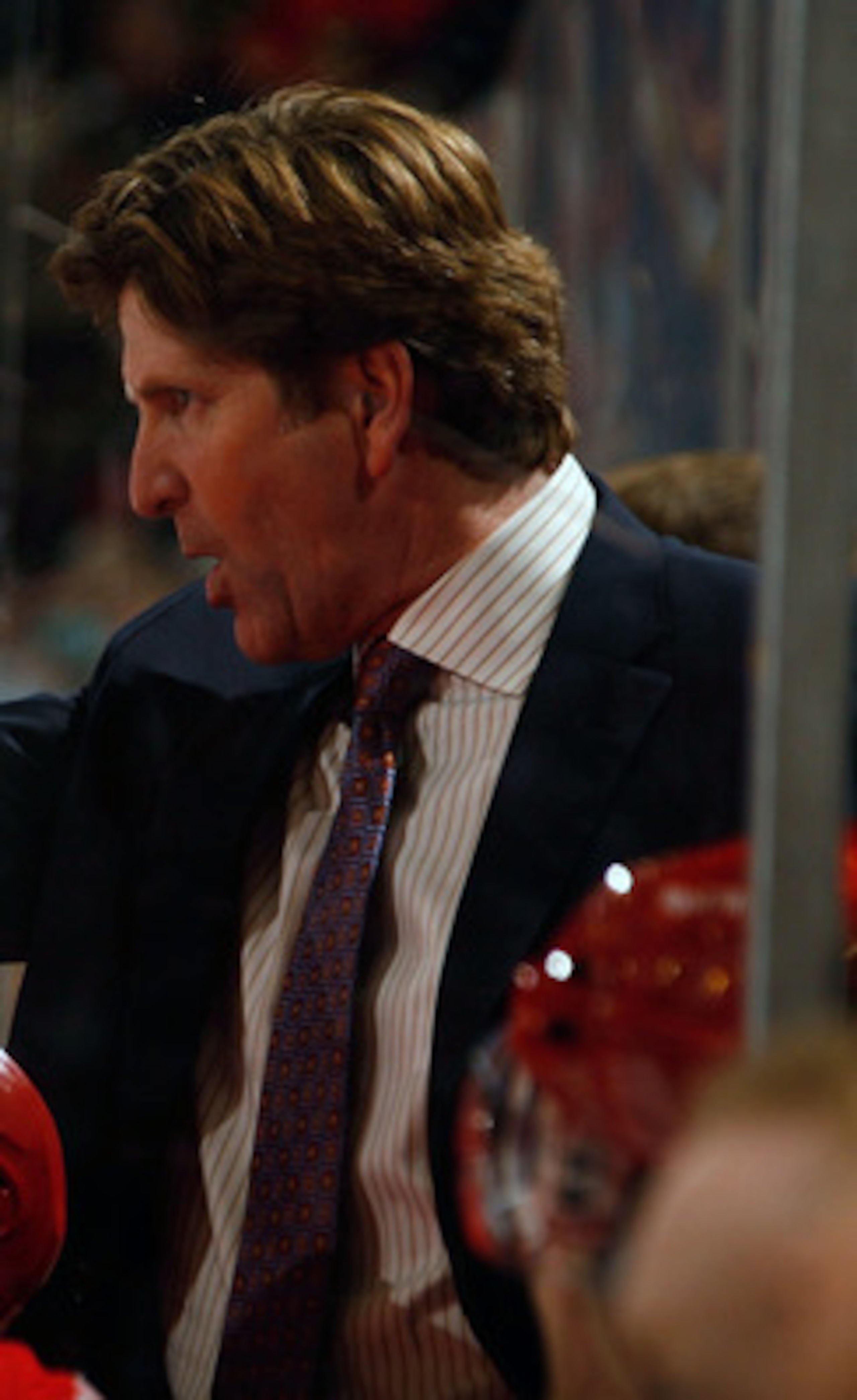DETROIT, MI - NOVEMBER 21:  Head Coach Mike Babcock of the Detroit Red Wings gives direction to his team as they face the Calgary Flames during their NHL game at Joe Louis Arena on November 21, 2010 in Detroit, Michigan.(Photo by Dave Sandford/Getty Image