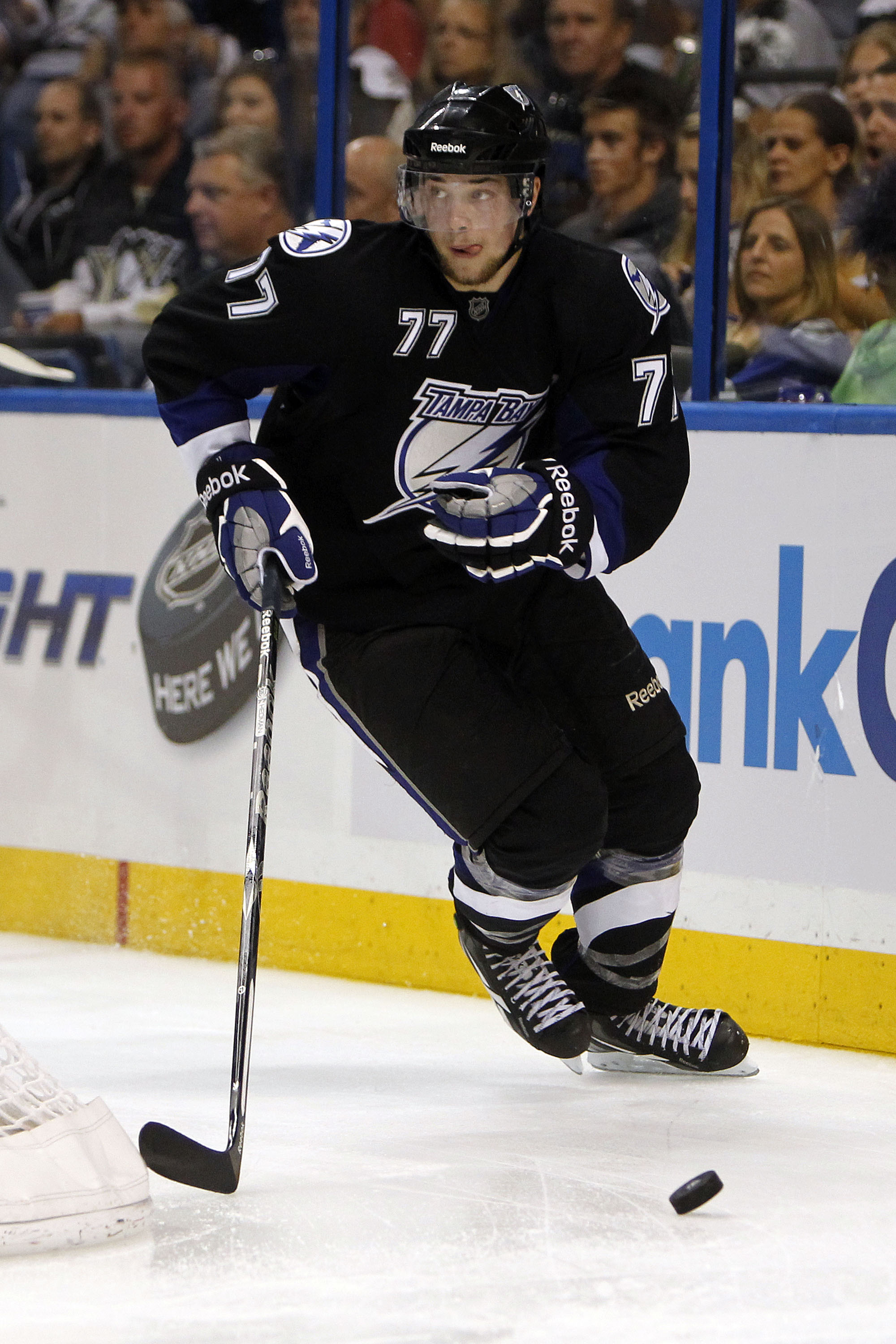TAMPA, FL - APRIL 18: Victor Hedman #77 of the Tampa Bay Lightning skates with the puck against the Pittsburgh Penguins in Game Three of the Eastern Conference Quarterfinals during the 2011 NHL Stanley Cup Playoffs at the St. Pete Times Forum on April 18,