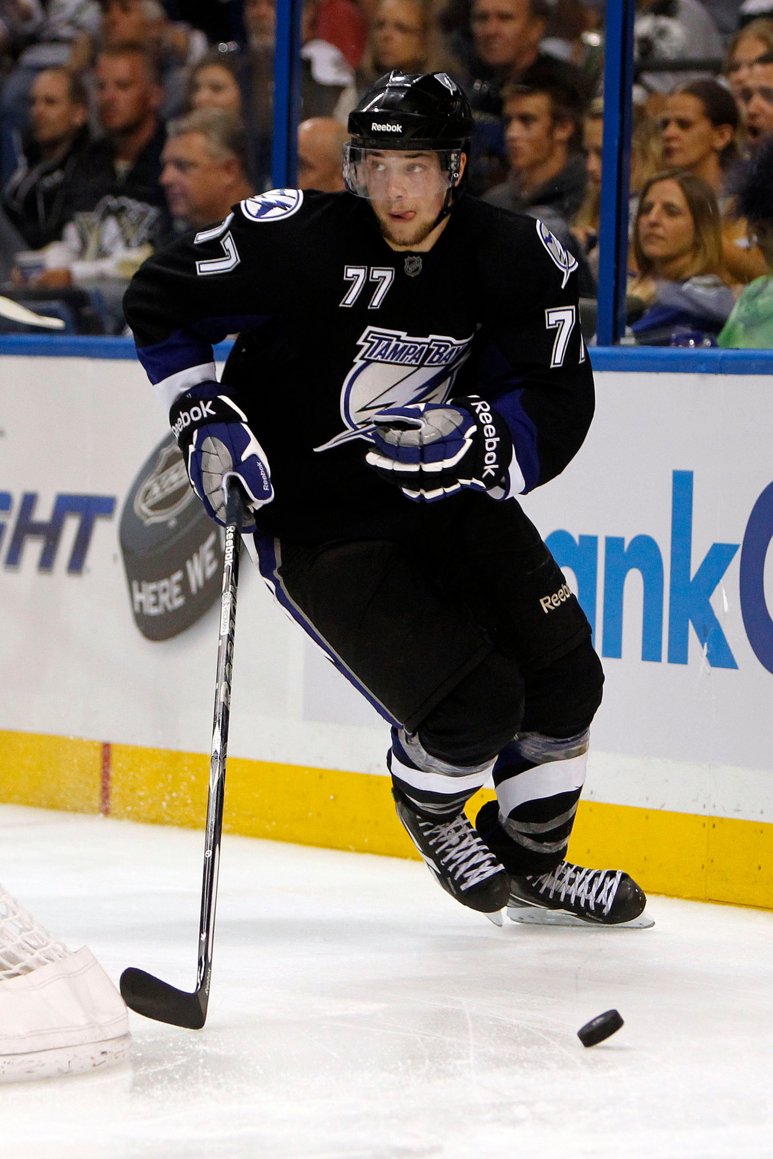 TAMPA, FL - APRIL 18: Victor Hedman #77 of the Tampa Bay Lightning skates with the puck against the Pittsburgh Penguins in Game Three of the Eastern Conference Quarterfinals during the 2011 NHL Stanley Cup Playoffs at the St. Pete Times Forum on April 18,