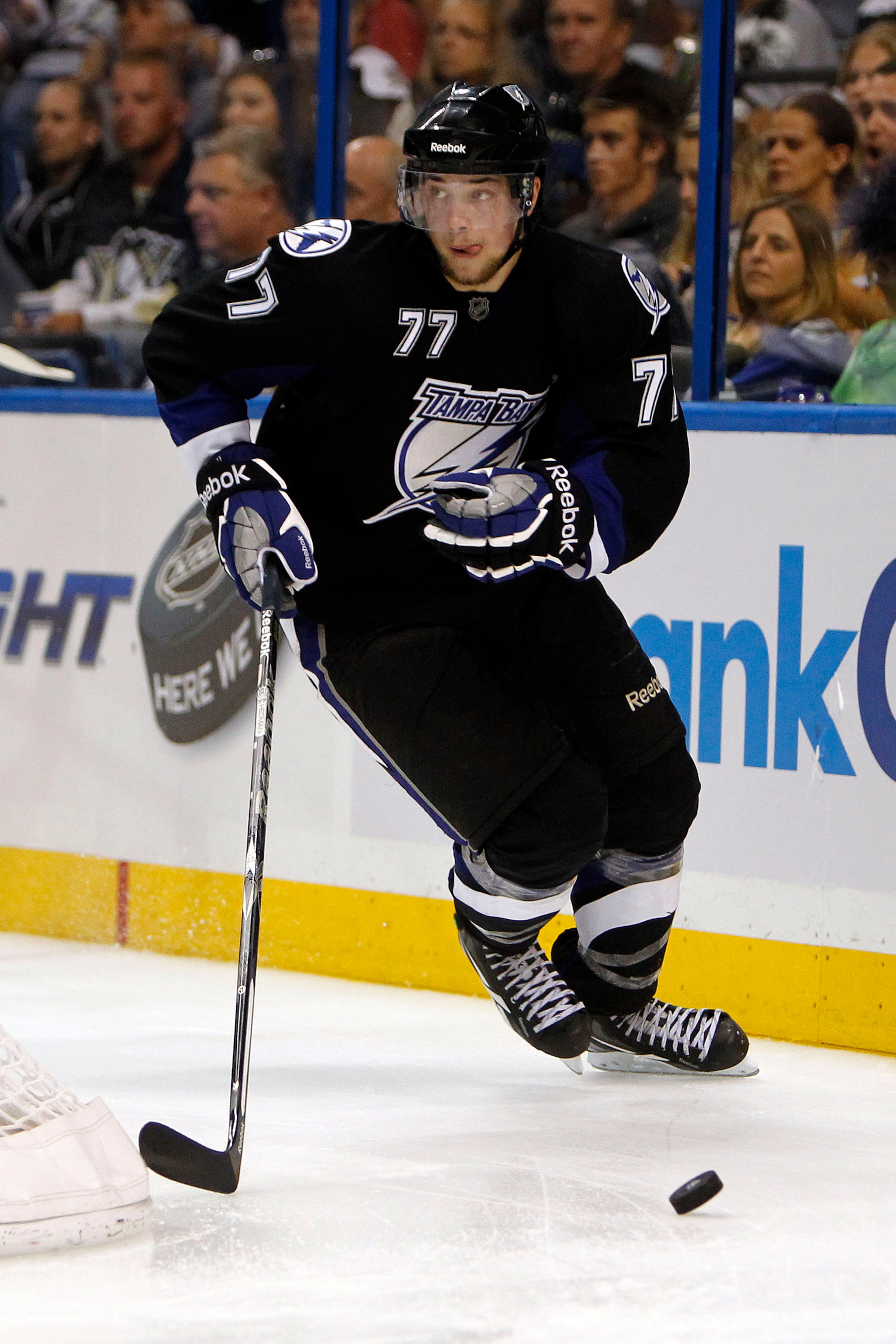 TAMPA, FL - APRIL 18: Victor Hedman #77 of the Tampa Bay Lightning skates with the puck against the Pittsburgh Penguins in Game Three of the Eastern Conference Quarterfinals during the 2011 NHL Stanley Cup Playoffs at the St. Pete Times Forum on April 18,