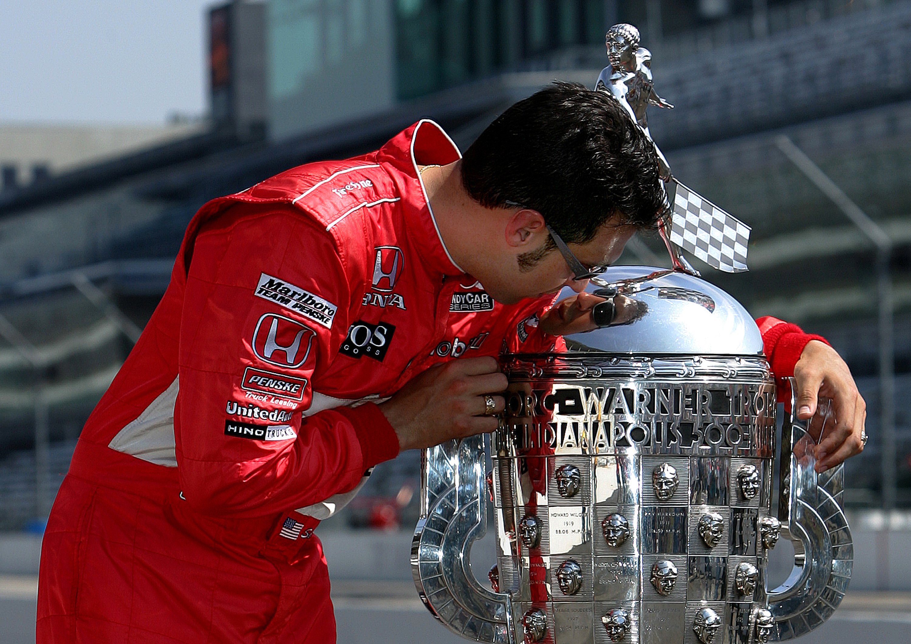 INDIANAPOLIS - MAY 29:  Sam Hornish Jr., driver of the #6 Marlboro Team Penske Dallara Honda, kisses the trophy during the Official Borg Warner Trophy presentation for the IRL IndyCar Series 90th running of the Indianapolis 500 on May 29, 2006 at the Indi