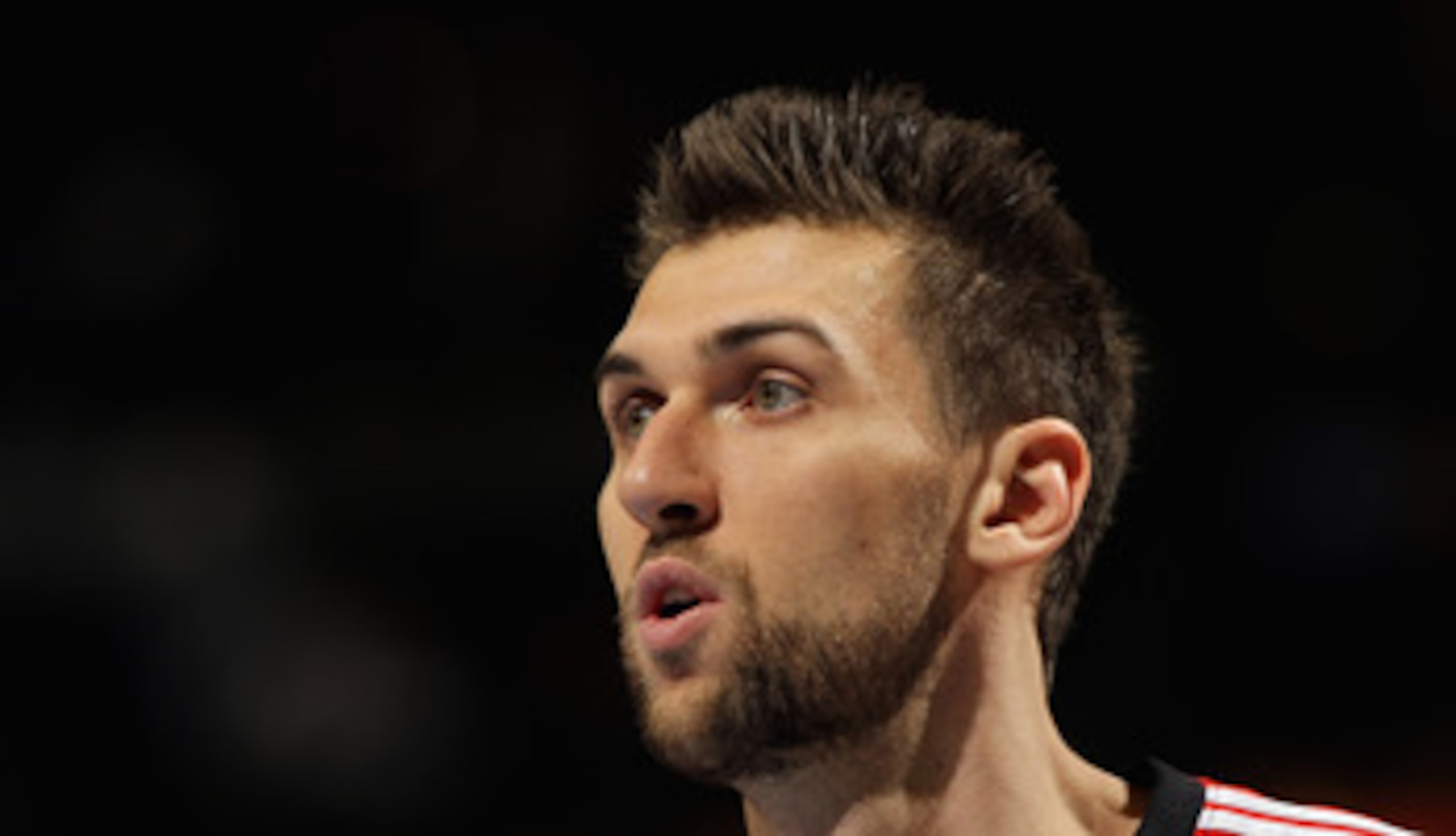 DENVER, CO - MARCH 21:  Andrea Bargnani #7 of the Toronto Raptors looks on during a break in the action against the Denver Nuggets at the Pepsi Center on March 21, 2011 in Denver, Colorado. The Nuggets defeated the Raptors 123-90. NOTE TO USER: User expre