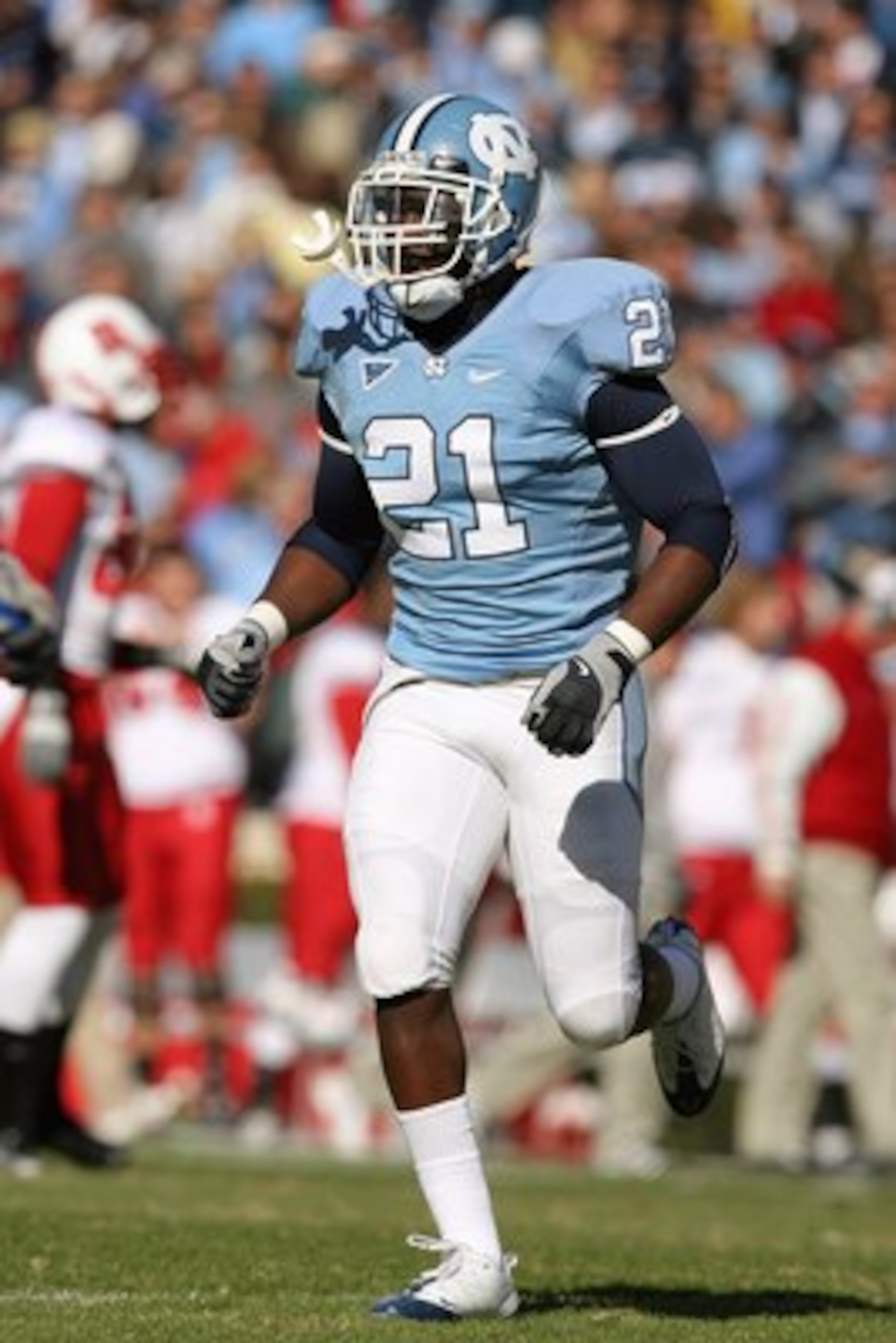 CHAPEL HILL, NC - NOVEMBER 22:  Da'Norris Searcy #21 of the North Carolina Tar Heels runs on the field during the game the North Carolina State Wolfpack at Kenan Stadium on November 22, 2008 in Chapel Hill, North Carolina. (Photo by Streeter Lecka/Getty I