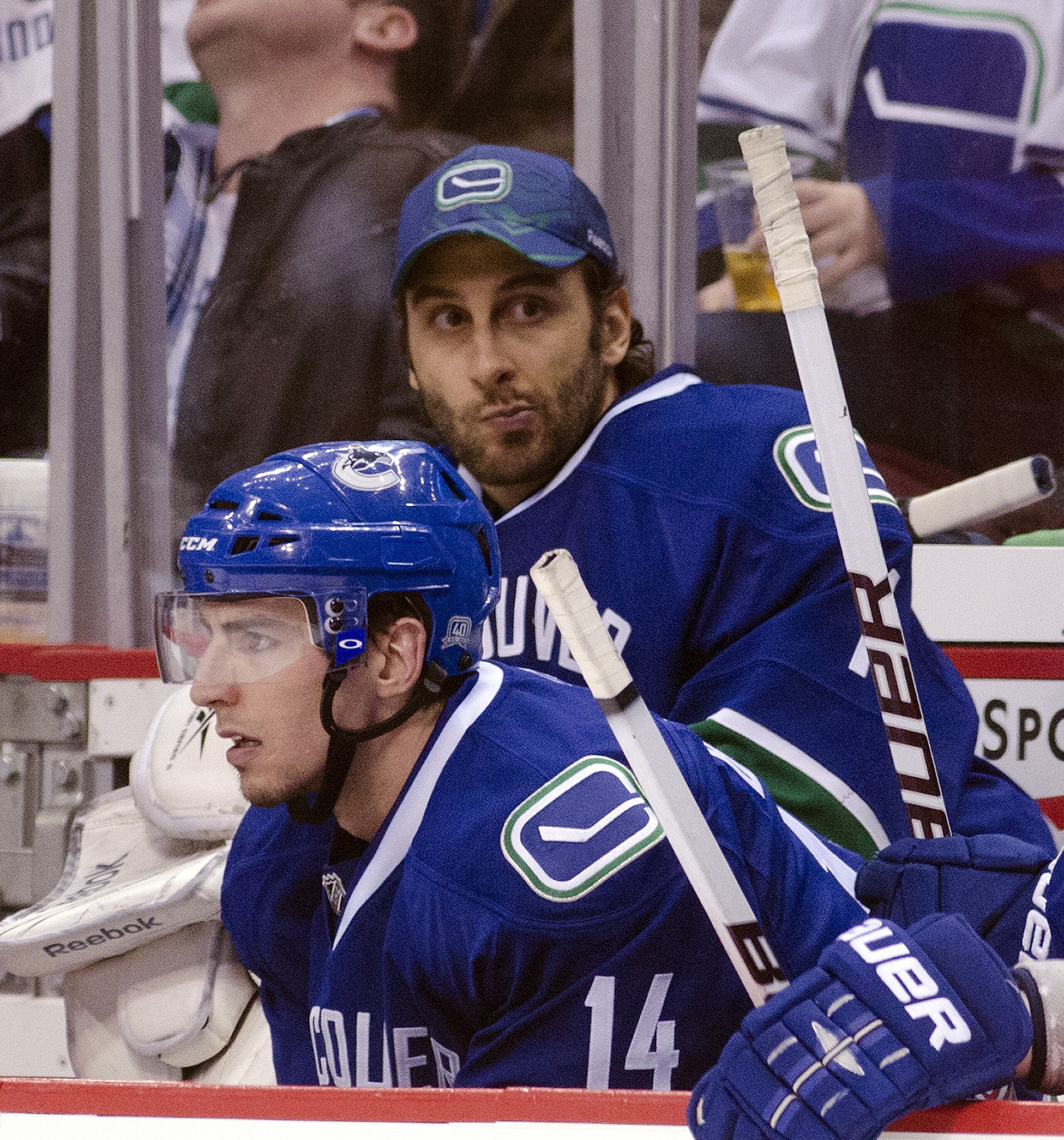 VANCOUVER, CANADA - APRIL 21: Goalie Roberto Luongo #1 of the Vancouver Canucks watches the third period of Game Five of the Western Conference Quarterfinals against the Chicago Blackhawks from the bench with Alexandre Burrows #14 during the 2011 NHL Stan