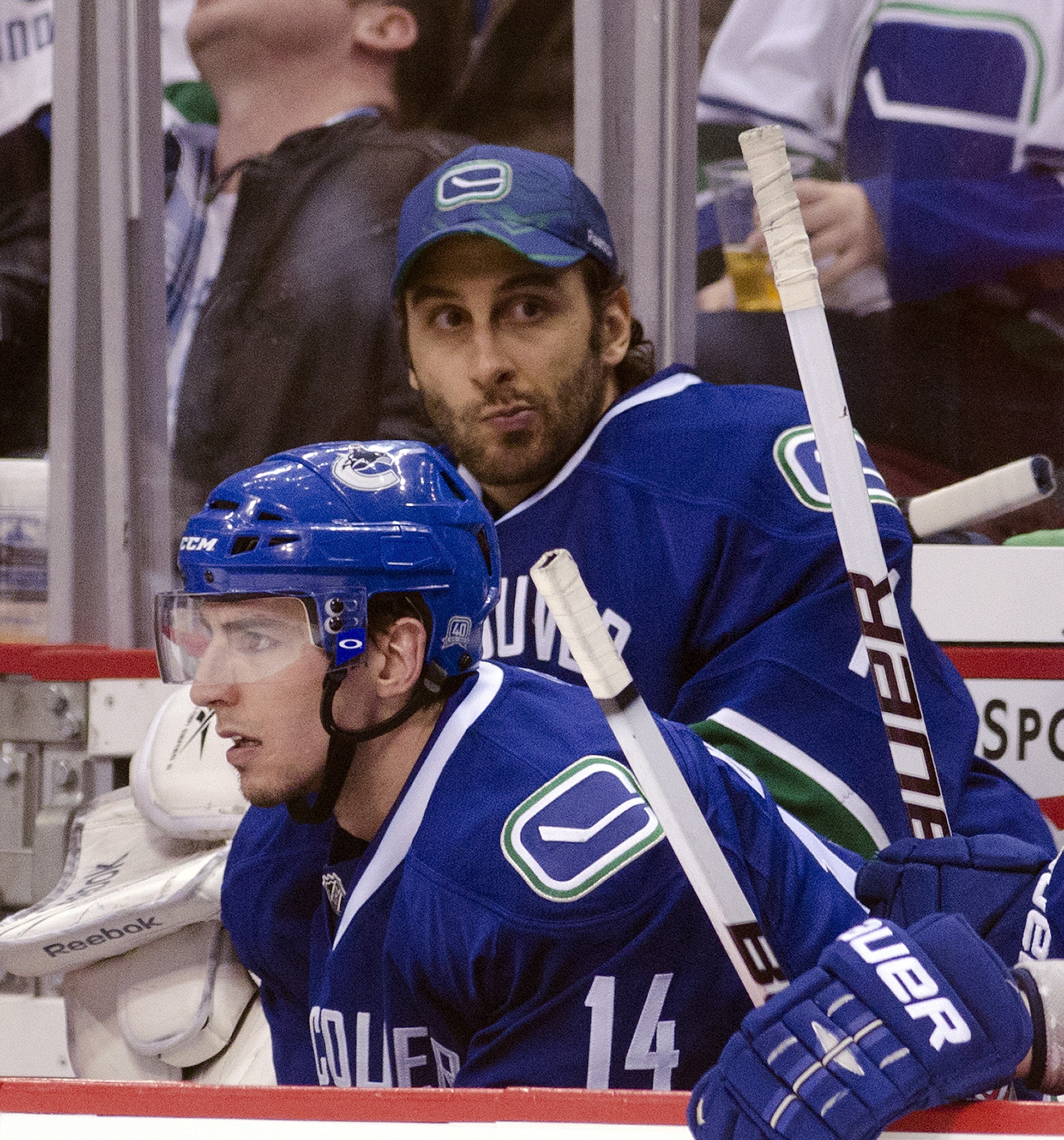 VANCOUVER, CANADA - APRIL 21: Goalie Roberto Luongo #1 of the Vancouver Canucks watches the third period of Game Five of the Western Conference Quarterfinals against the Chicago Blackhawks from the bench with Alexandre Burrows #14 during the 2011 NHL Stan