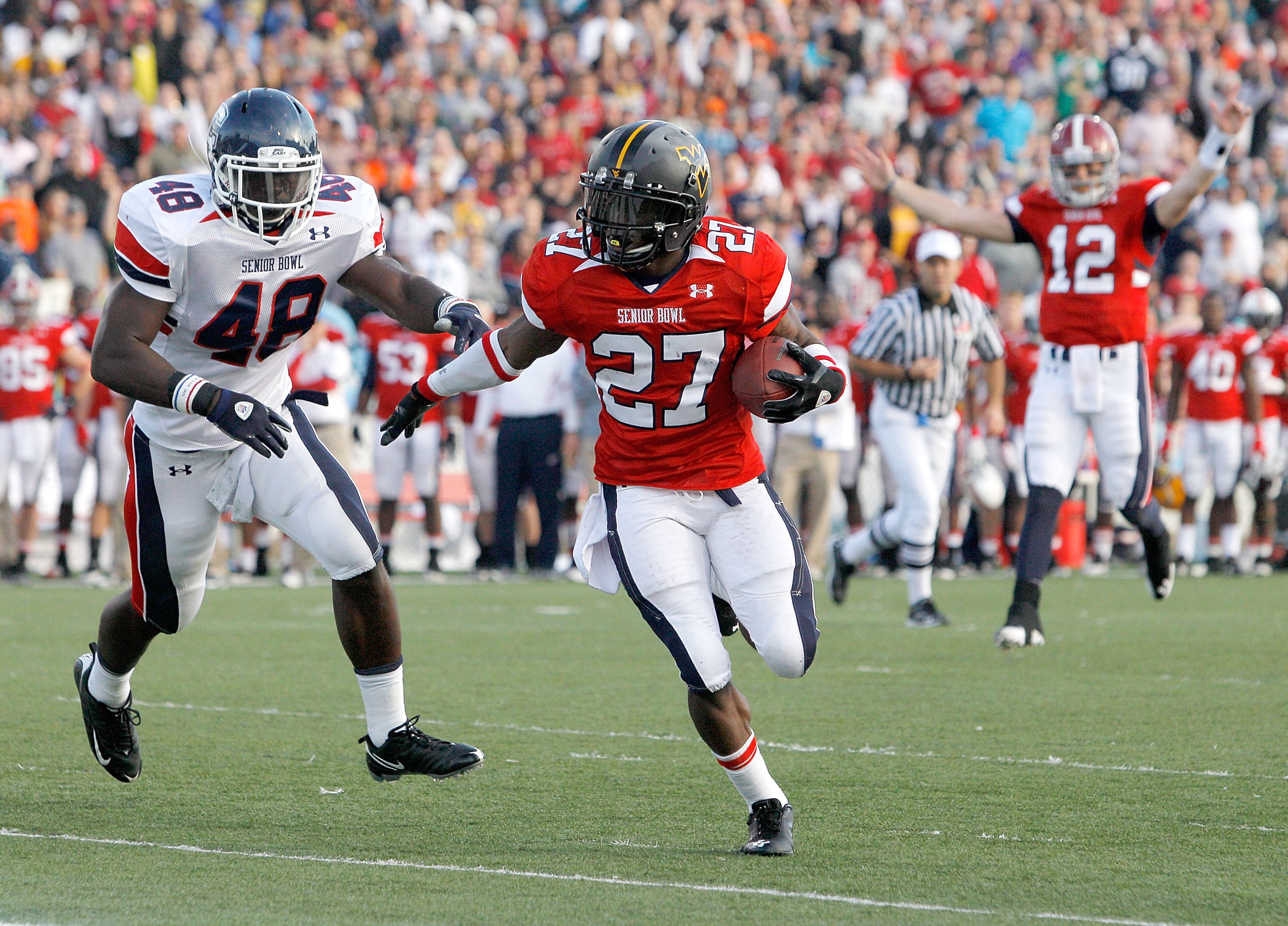 MOBILE, AL - JANUARY 29: Running back Noel Devine #27 of the Under Armour South Team scores a touchdown during the second quarter of the Under Armour Senior Bowl on January 29, 2011 at Ladd-Pebbles Stadium in Mobile, Alabama.  (Photo by Sean Gardner/Getty