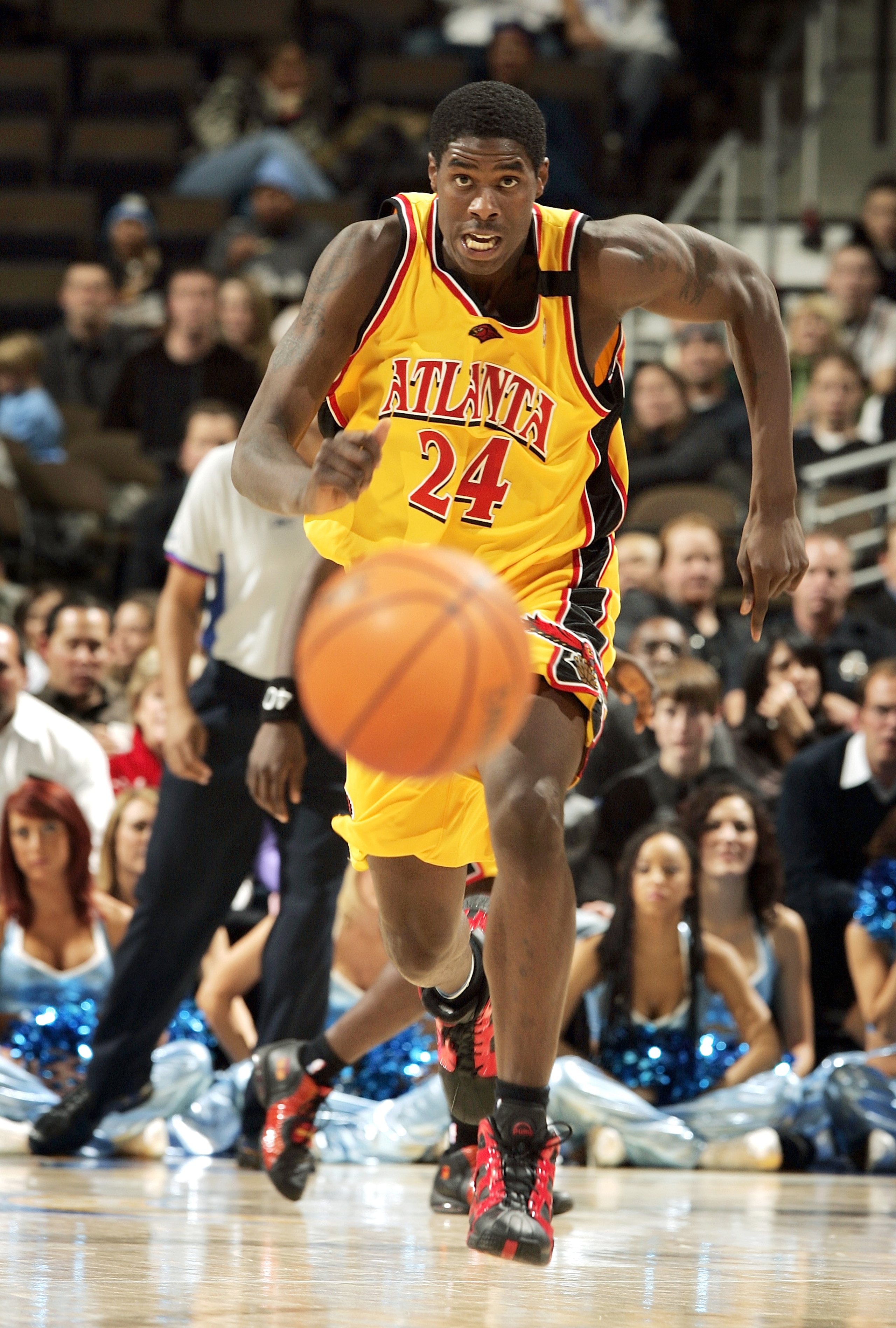 DENVER - DECEMBER 6:  Marvin Williams #24 of the Atlanta Hawks chases the ball after the Denver Nuggets lost control of it in the second quarter on December 6, 2005 at the Pepsi Center in Denver, Colorado.  NOTE TO USER:  User expressly acknowledges and a