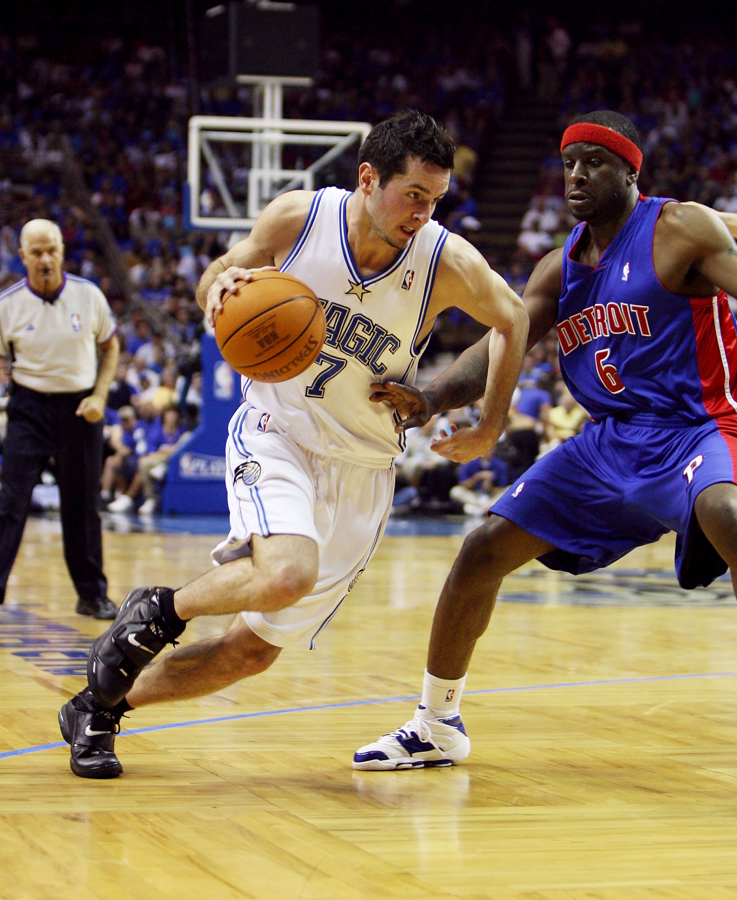 ORLANDO, FL - APRIL 28:  J.J. Redick #7 of the Orlando Magic tries to drive past Flip Murray #6 of the Detroit Pistons in the first half in Game Four of the Eastern Conference Quarterfinals during the 2007 NBA Playoffs at Amway Arena on April 28, 2007 in 