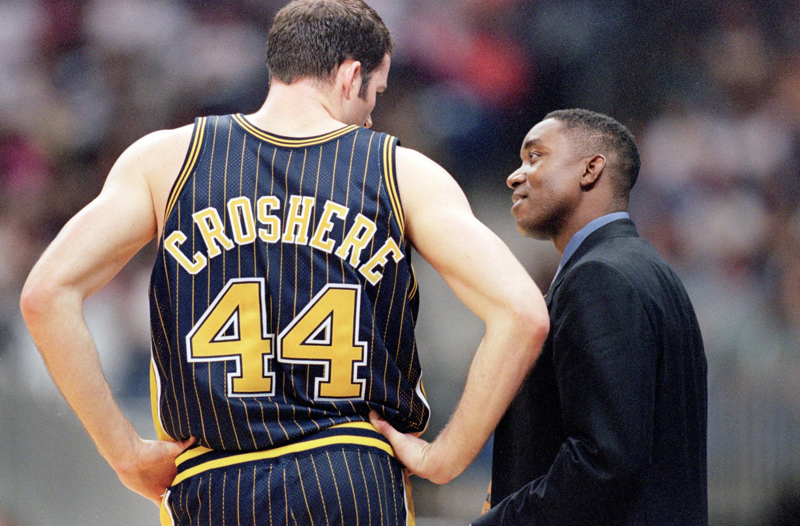 31 Oct 2000:  Head Coach Isiah Thomas of the Indiana Pacers talks to Austin Croshere #44 on the sidelines during the game against the San Antonio Spurs at the Alamodome in San Antonio, Texas. The Spurs defeated the Pacers 98-85.    NOTE TO USER: It is exp