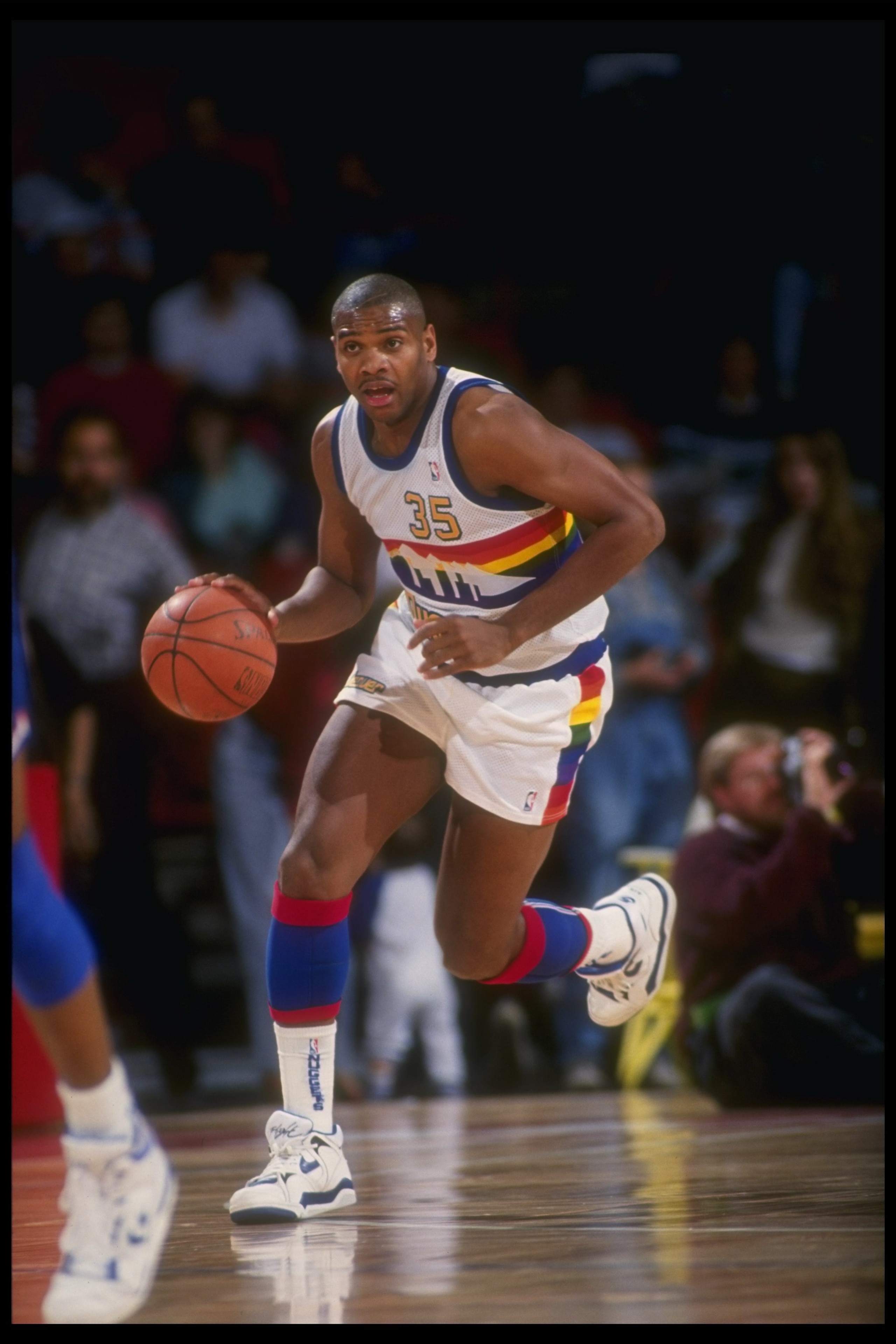 Forward Jerome Lane of the Denver Nuggets moves the ball during a game at the McNichols Sports Arena in Denver, Colorado.