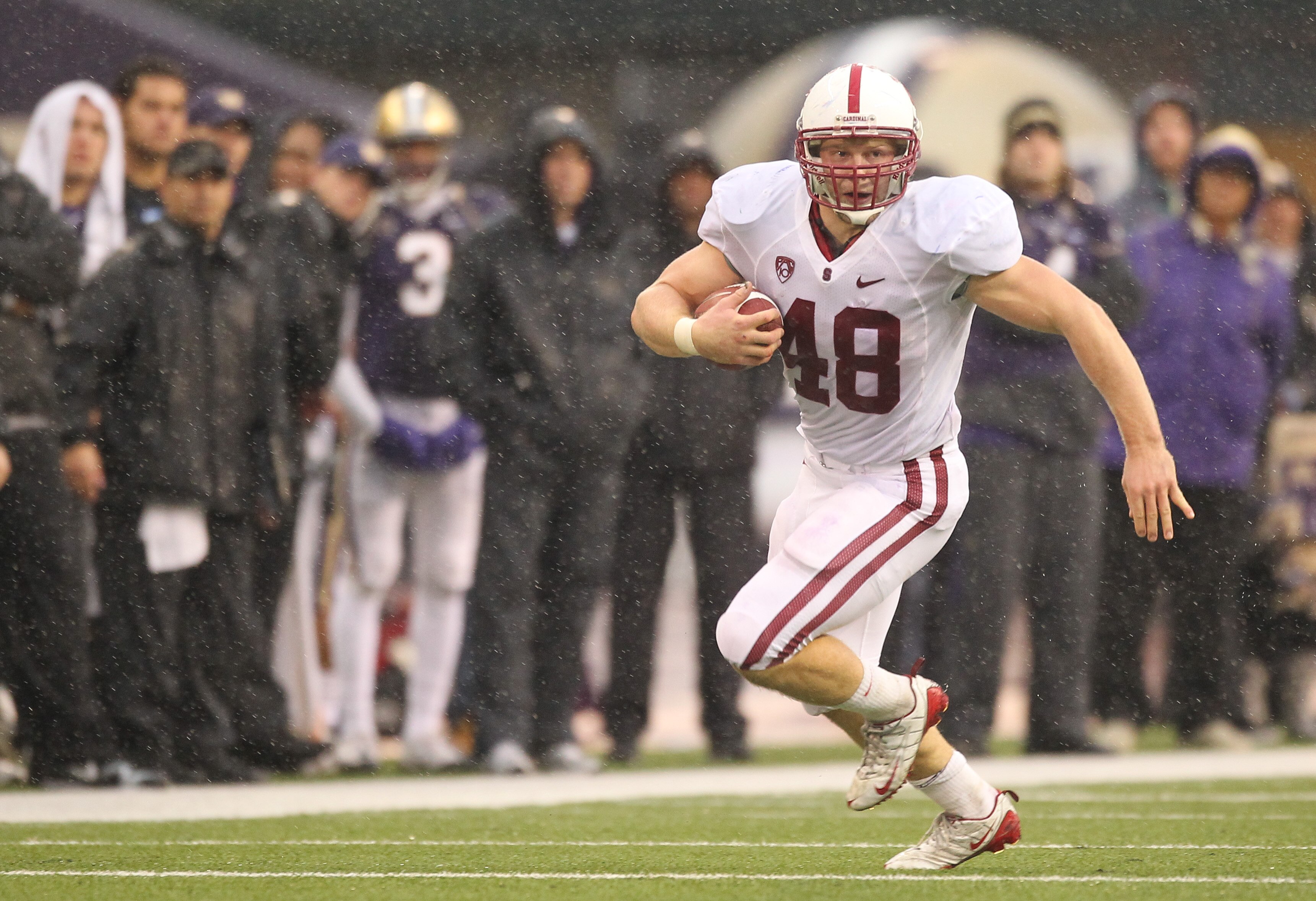 SEATTLE - OCTOBER 30:  Running back Owen Marecic #48 of the Stanford Cardinal rushes against the Washington Huskies on October 30, 2010 at Husky Stadium in Seattle, Washington. Stanford won 41-0. (Photo by Otto Greule Jr/Getty Images)