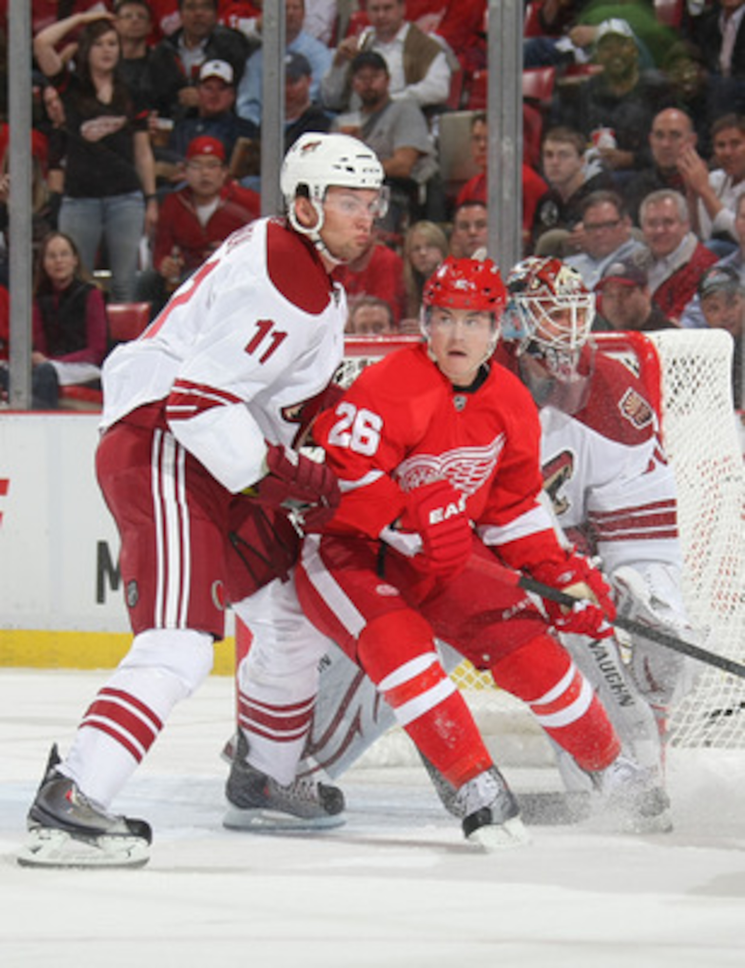 DETROIT, MI- APRIL 13: Jiri Hudler #26 of the Detroit Red Wings battles for position with Martin Hanzal #11 of the Phoenix Coyotes in Game One of the Western Conference Quarterfinals during the 2011 NHL Stanley Cup Playoffs at Joe Louis Arena on April 13 DETROIT, MI- APRIL 13: Jiri Hudler #26 of the Detroit Red Wings battles for position with Martin Hanzal #11 of the Phoenix Coyotes in Game One of the Western Conference Quarterfinals during the 2011 NHL Stanley Cup Playoffs at Joe Louis Arena on April 13