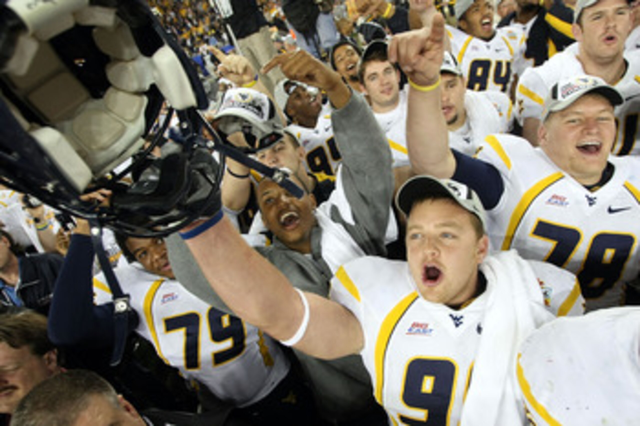 GLENDALE, AZ - JANUARY 02: Defensive lineman Chris Neild #90 of the West Virginia Mountaineers celebrates after the Mountaineers defeated the Oklahoma Sooners 48-28 after the Tostito's Fiesta Bowl at University of Phoenix Stadium January 2, 2008 in Glend GLENDALE, AZ - JANUARY 02: Defensive lineman Chris Neild #90 of the West Virginia Mountaineers celebrates after the Mountaineers defeated the Oklahoma Sooners 48-28 after the Tostito's Fiesta Bowl at University of Phoenix Stadium January 2, 2008 in Glend