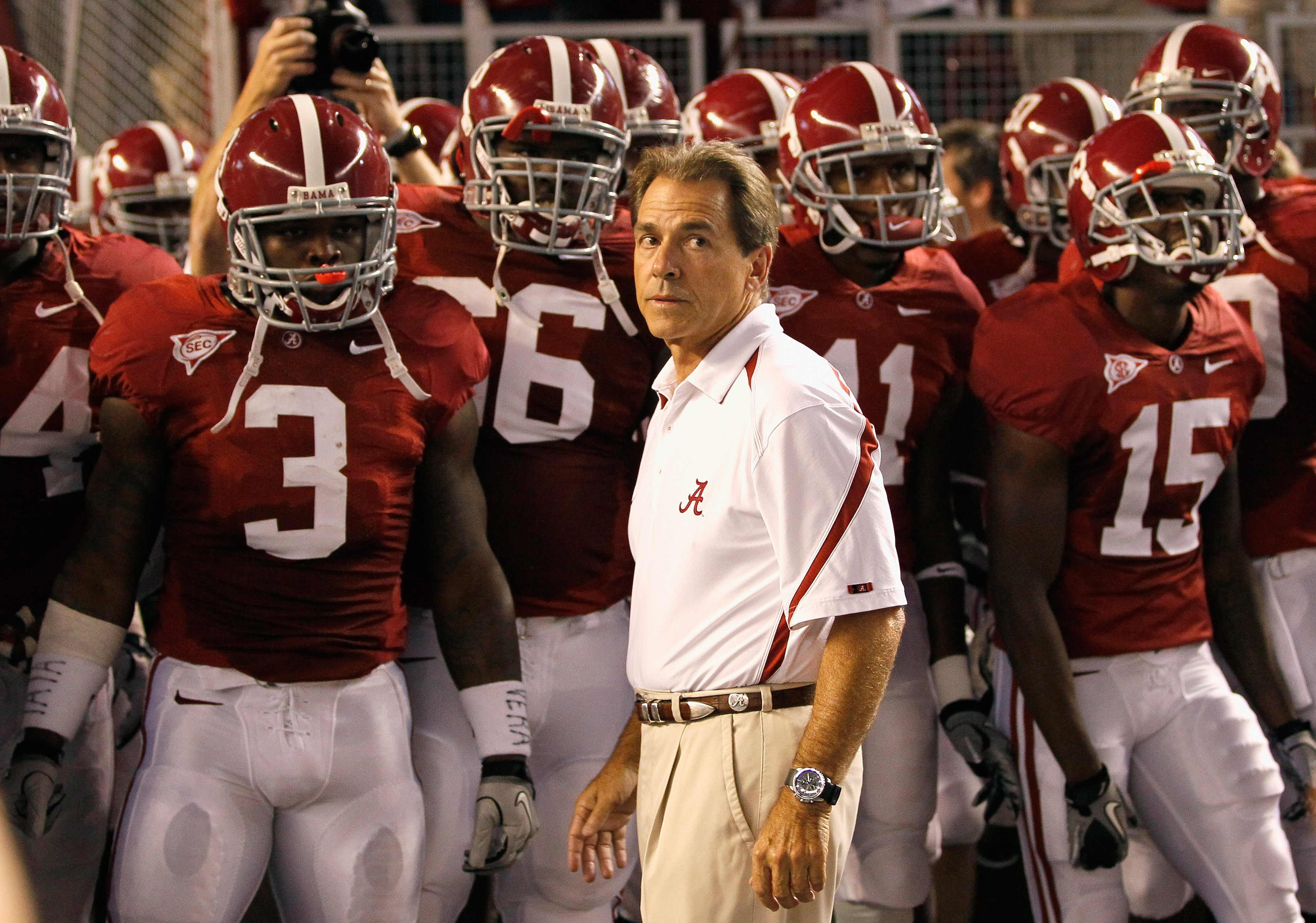 TUSCALOOSA, AL - OCTOBER 02:  Head coach Nick Saban of the Alabama Crimson Tide leads his team onto the field to face the Florida Gators at Bryant-Denny Stadium on October 2, 2010 in Tuscaloosa, Alabama.  (Photo by Kevin C. Cox/Getty Images)