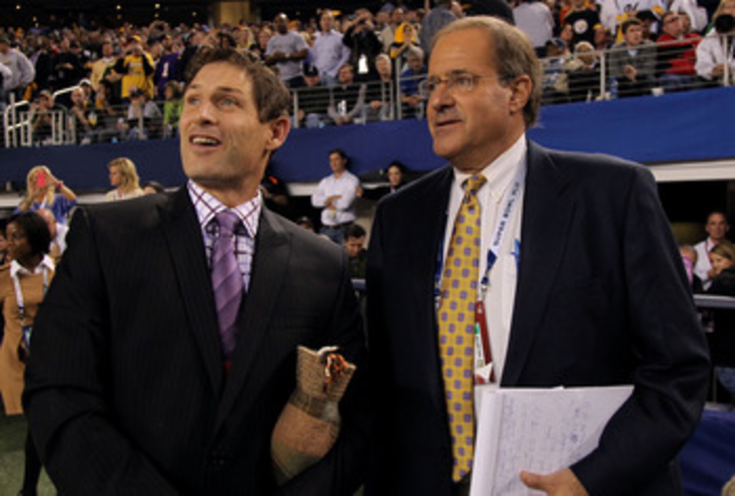ARLINGTON, TX - FEBRUARY 06:  ESPN TV personalities Steve Young and Chris Berman on the field during Super Bowl XLV at Cowboys Stadium on February 6, 2011 in Arlington, Texas.  (Photo by Doug Pensinger/Getty Images)