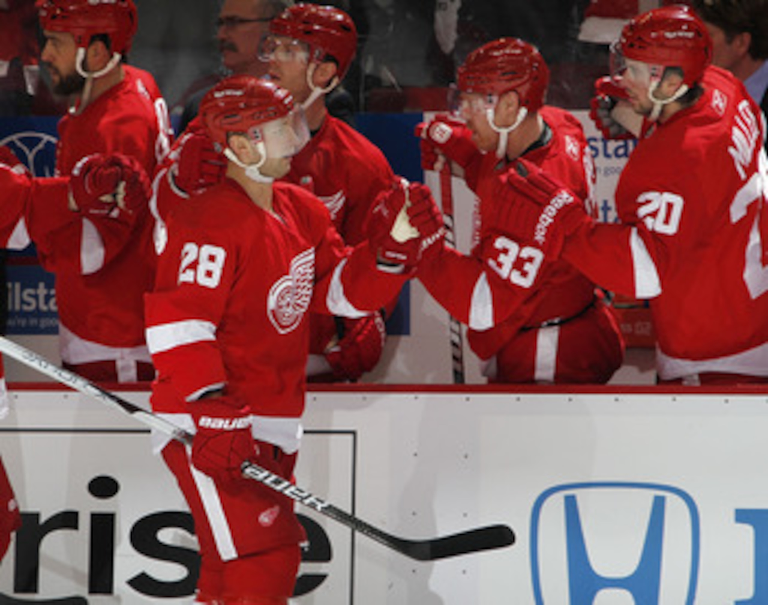 DETROIT, MI - APRIL 16: Brian Rafalski #28 of the Detroit Red Wings celebrates a first-period goal with the bench while playing the Phoenix Coyotes in Game Two of the Western Conference Quarterfinals during the 2011 Stanley Cup Playoffs at Joe Louis Aren DETROIT, MI - APRIL 16: Brian Rafalski #28 of the Detroit Red Wings celebrates a first-period goal with the bench while playing the Phoenix Coyotes in Game Two of the Western Conference Quarterfinals during the 2011 Stanley Cup Playoffs at Joe Louis Aren