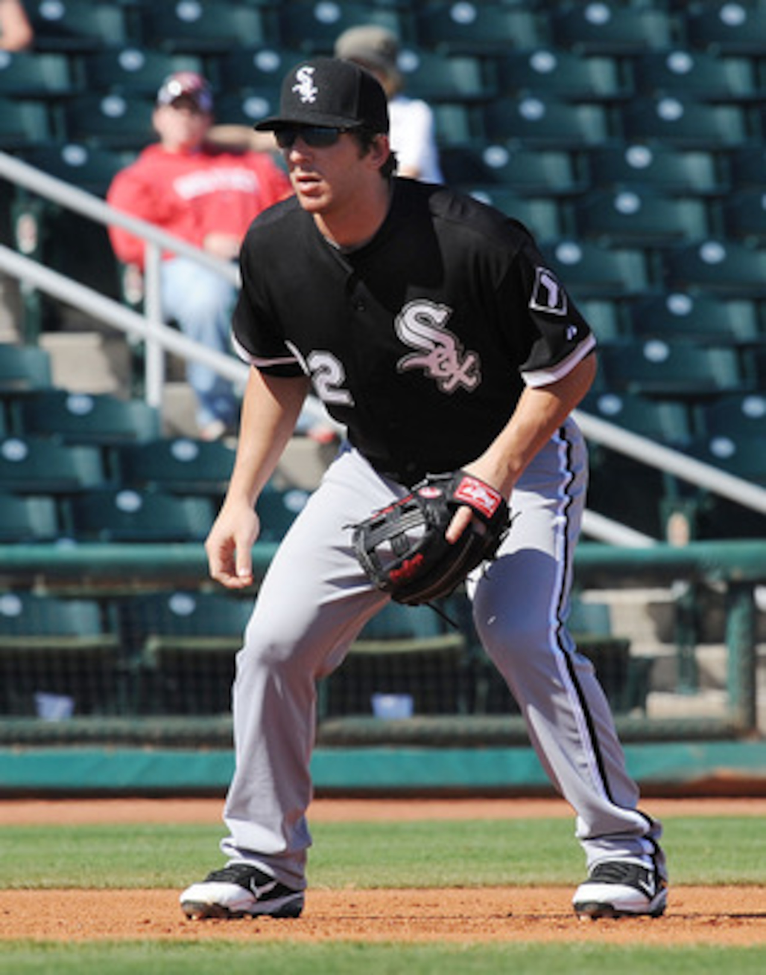 GOODYEAR, AZ - MARCH 02:  Brent Morel #22 of the Chicago White Sox gets ready to make a play against the Cincinnati Reds during a spring training game at Goodyear Ballpark on March 2, 2011 in Goodyear, Arizona.  (Photo by Norm Hall/Getty Images)