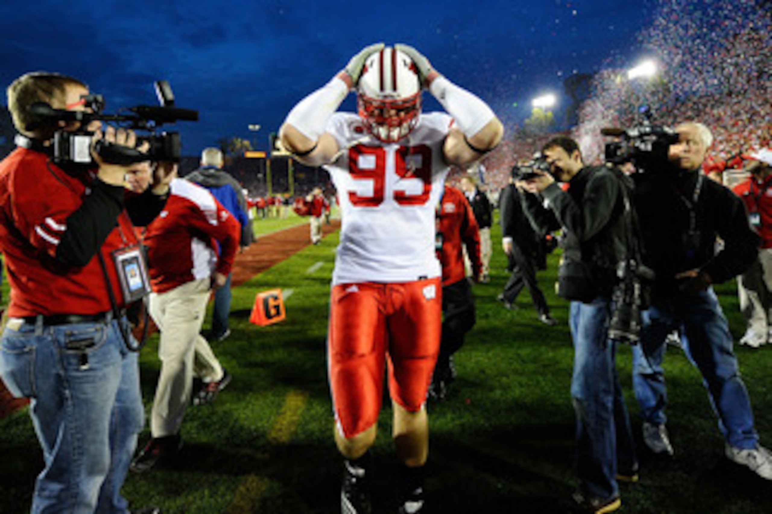 PASADENA, CA - JANUARY 01:  Defensive lineman J.J. Watt #99 of the Wisconsin Badgers walks off the field after losing 21-19 to the TCU Horned Frogs in the 97th Rose Bowl game on January 1, 2011 in Pasadena, California.  (Photo by Kevork Djansezian/Getty I