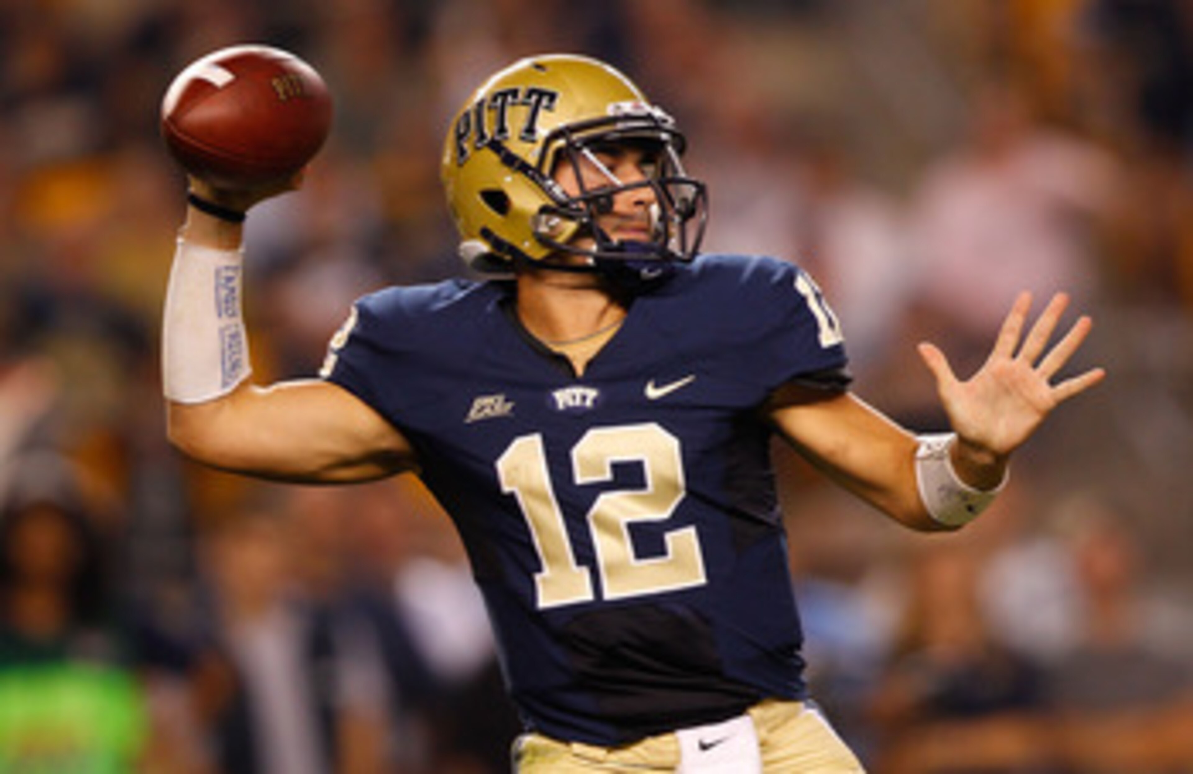 PITTSBURGH - SEPTEMBER 23: Tino Sunseri #12 of the Pittsburgh Panthers drops back to pass against the Miami Hurricanes on September 23, 2010 at Heinz Field in Pittsburgh, Pennsylvania. (Photo by Jared Wickerham/Getty Images) PITTSBURGH - SEPTEMBER 23: Tino Sunseri #12 of the Pittsburgh Panthers drops back to pass against the Miami Hurricanes on September 23, 2010 at Heinz Field in Pittsburgh, Pennsylvania. (Photo by Jared Wickerham/Getty Images)