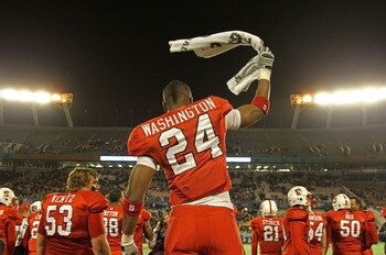 ORLANDO, FL - DECEMBER 28:  James Washington #24 of the North Carolina State Wolfpack celebrates after winning  the Champs Sports Bowl against the West Virginia Mountineers at Florida Citrus Bowl Stadium on December 28, 2010 in Orlando, Florida.  (Photo b