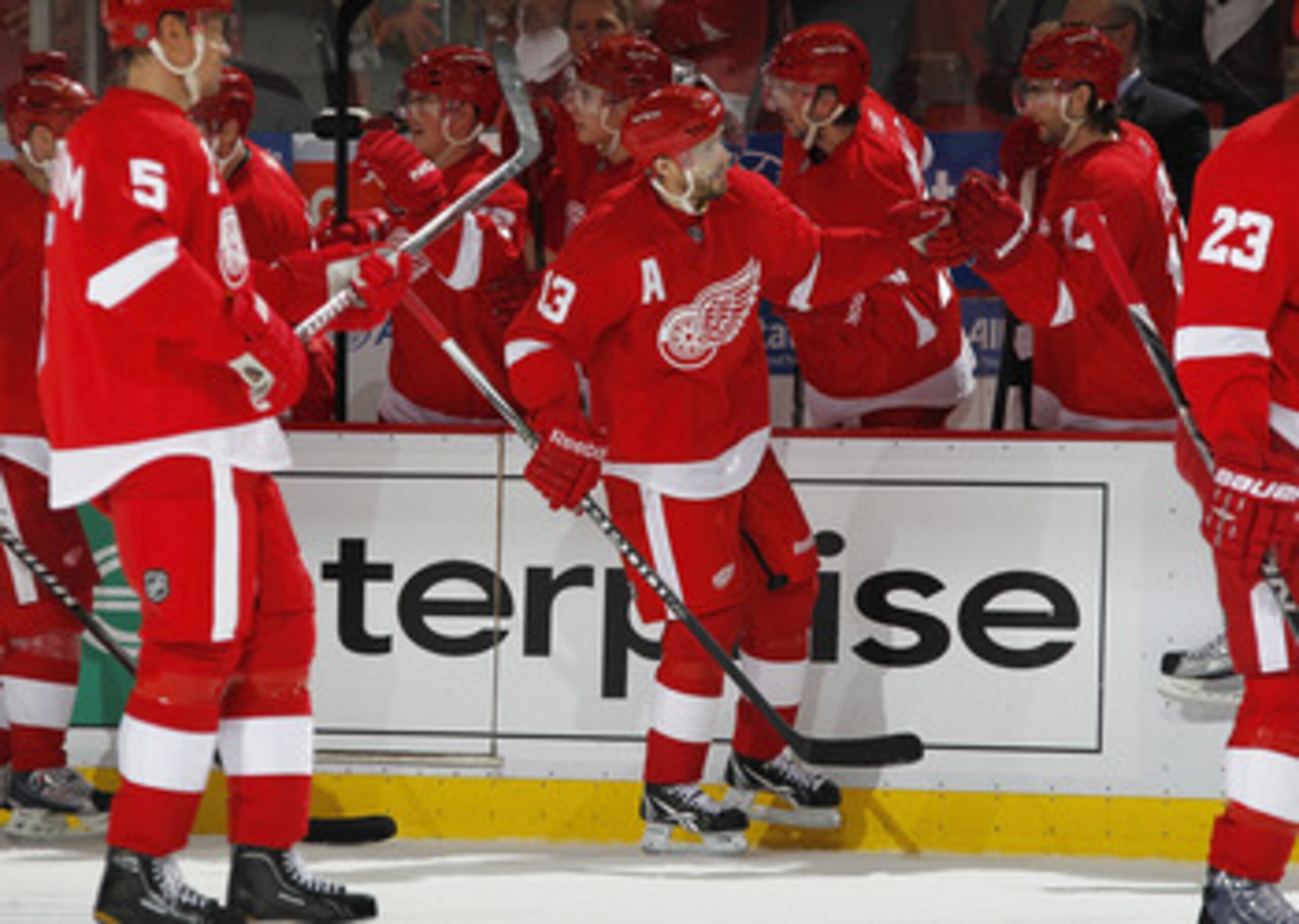 DETROIT, MI - APRIL 16: Pavel Datsyuk #13 of the Detroit Red Wings is congratulated by teammates while playing the Phoenix Coyotes in Game Two of the Western Conference Quarterfinals during the 2011 Stanley Cup Playoffs at Joe Louis Arena on April 16, 201