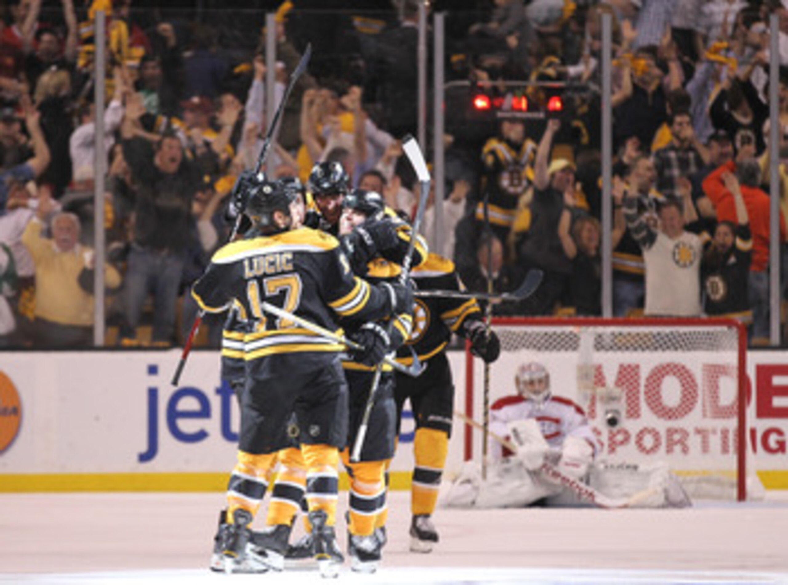 BOSTON, MA - APRIL 27: Nathan Horton #18 of the Boston Bruins celebrates with teammates after he scored the winning goal in overtime against the Montreal Canadiens in Game Seven of the Eastern Conference Quarterfinals during the 2011 NHL Stanley Cup Playo
