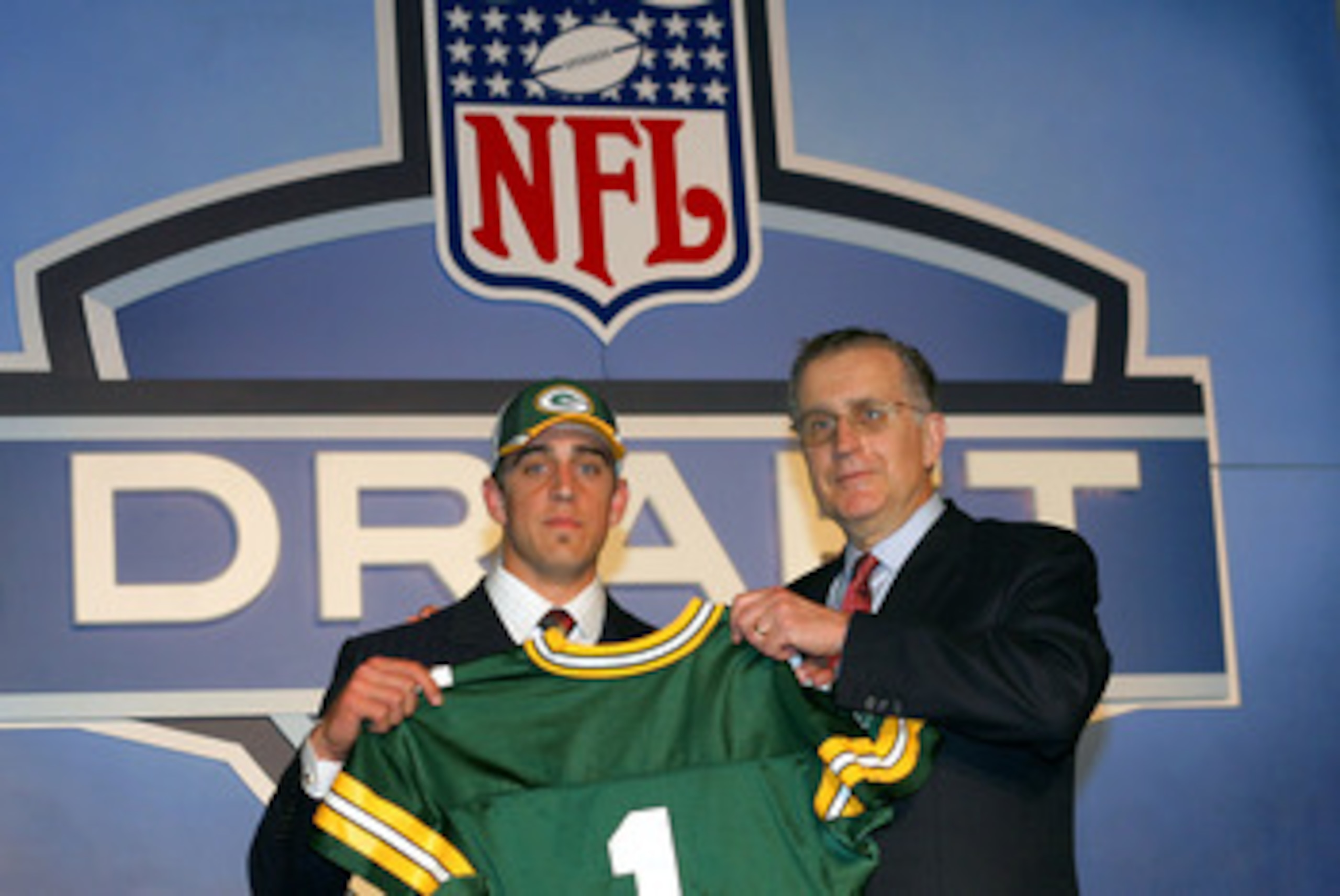 NEW YORK - APRIL 23:  Quarterback Aaron Rodgers (California) poses with NFL Commissioner Paul Tagliabue after Rodgers was drafted 24th overall by the Green Bay Packers during the 70th NFL Draft on April 23, 2005 at the Jacob K. Javits Convention Center in