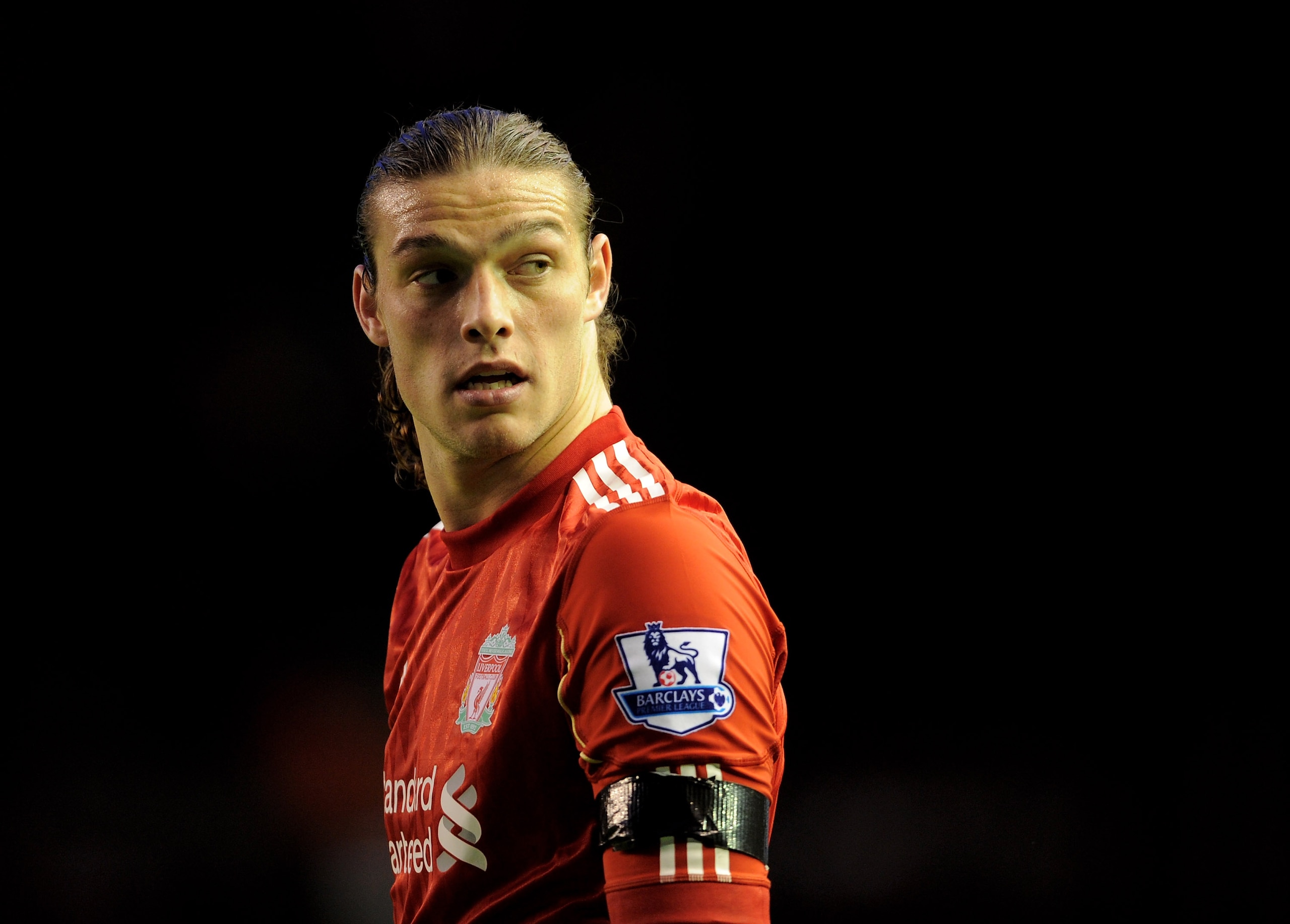 LIVERPOOL, ENGLAND - APRIL 11:  Andy Carroll of Liverpool looks on during the Barclays Premier League match between Liverpool and Manchester City at Anfield on April 11, 2011 in Liverpool, England.  (Photo by Michael Regan/Getty Images)
