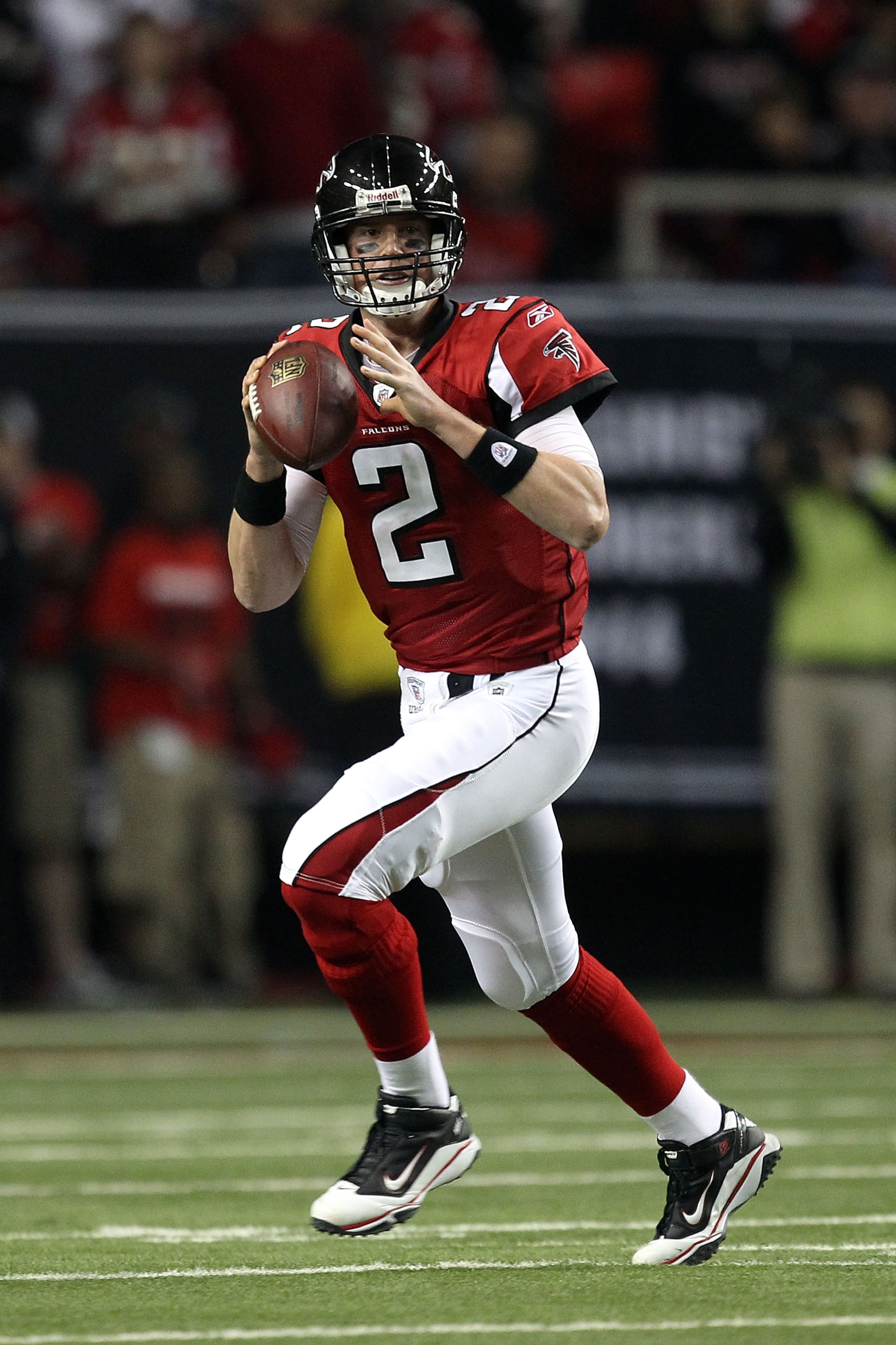 ATLANTA, GA - JANUARY 15: Quarterback Matt Ryan #2 of the Atlanta Falcons rolls out to pass against the Green Bay Packers during their 2011 NFC divisional playoff game at Georgia Dome on January 15, 2011 in Atlanta, Georgia. The Packers won 48-21. (Phot ATLANTA, GA - JANUARY 15: Quarterback Matt Ryan #2 of the Atlanta Falcons rolls out to pass against the Green Bay Packers during their 2011 NFC divisional playoff game at Georgia Dome on January 15, 2011 in Atlanta, Georgia. The Packers won 48-21. (Phot