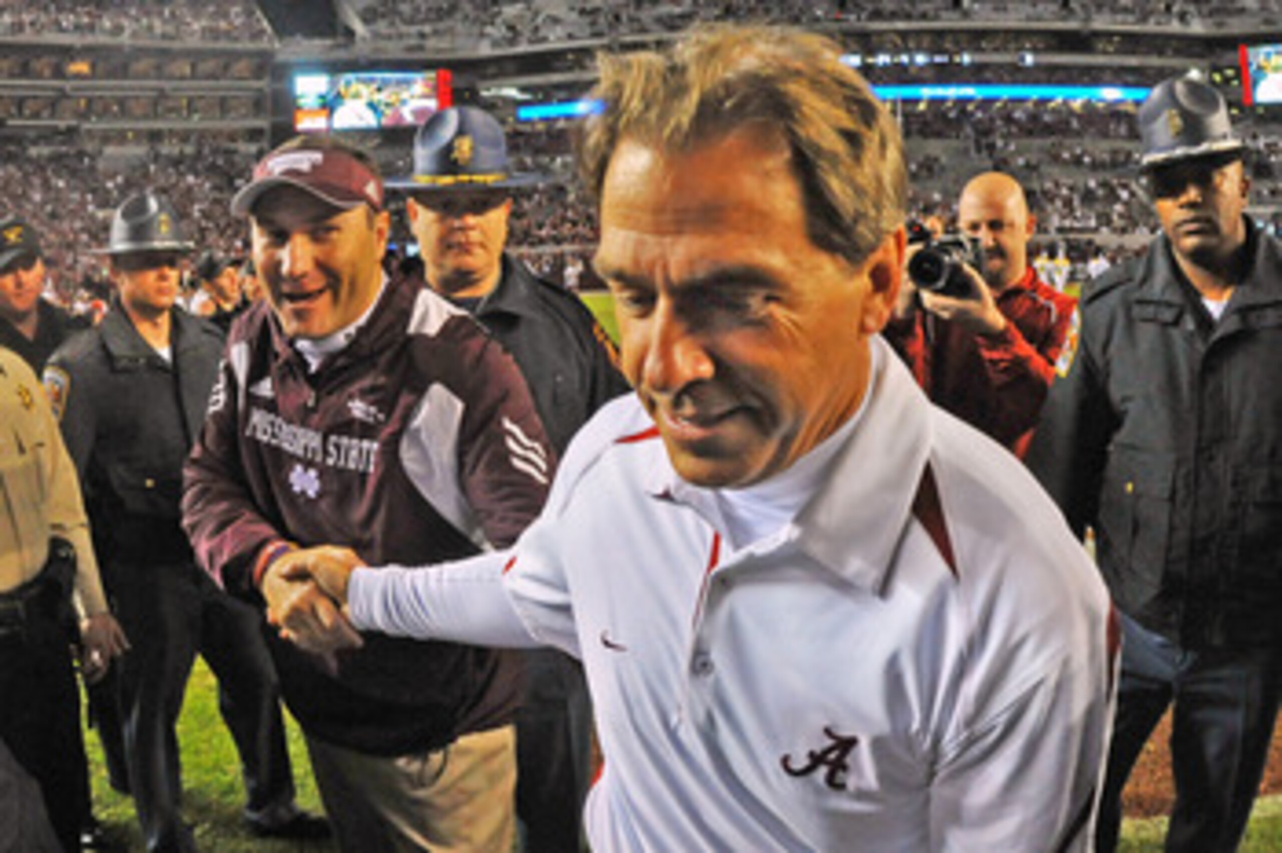 TUSCALOOSA, AL - NOVEMBER 13: Coach Dan Mullen of the Mississippi State Bulldogs shakes hands with coach Nick Saban of the Alabama Crimson Tide November 13, 2010 at Bryant-Denny Stadium in Tuscaloosa, Alabama.  (Photo by Al Messerschmidt/Getty Images)