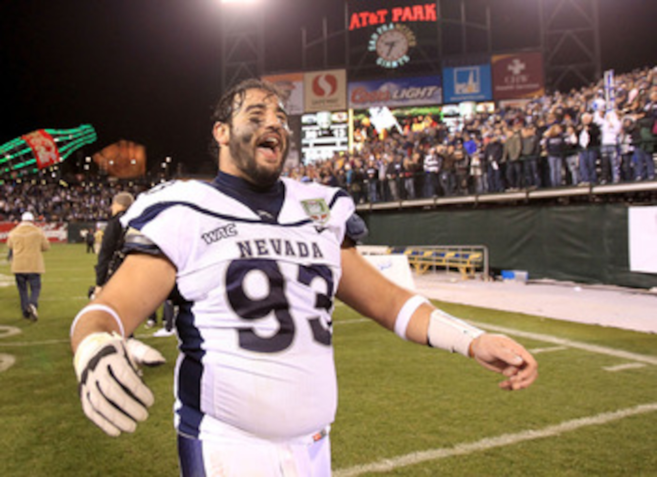 SAN FRANCISCO, CA - JANUARY 09:  Zack Madonick #93 of the Nevada Wolf Pack celebrates after beating Boston College in the Kraft Fight Hunger Bowl at AT&T Park on January 9, 2011 in San Francisco, California.  (Photo by Ezra Shaw/Getty Images)
