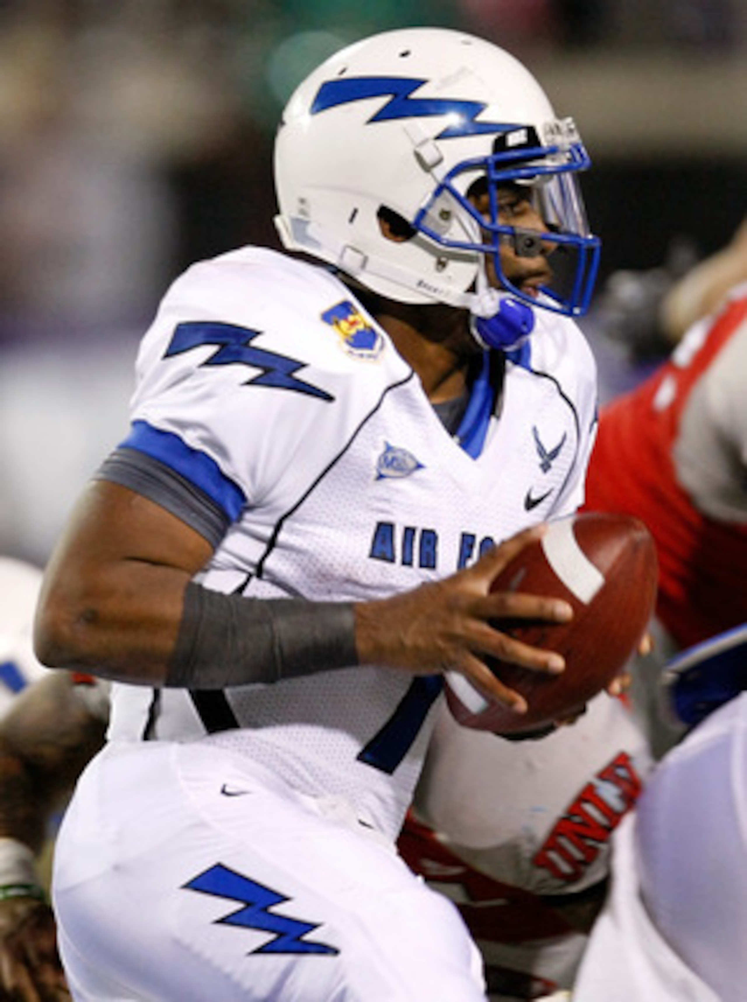 LAS VEGAS - NOVEMBER 18:  Quarterback Tim Jefferson Jr. #7 of the Air Force Falcons runs for yardage against the UNLV Rebels during their game at Sam Boyd Stadium November 18, 2010 in Las Vegas, Nevada. Air Force won 35-20.  (Photo by Ethan Miller/Getty I