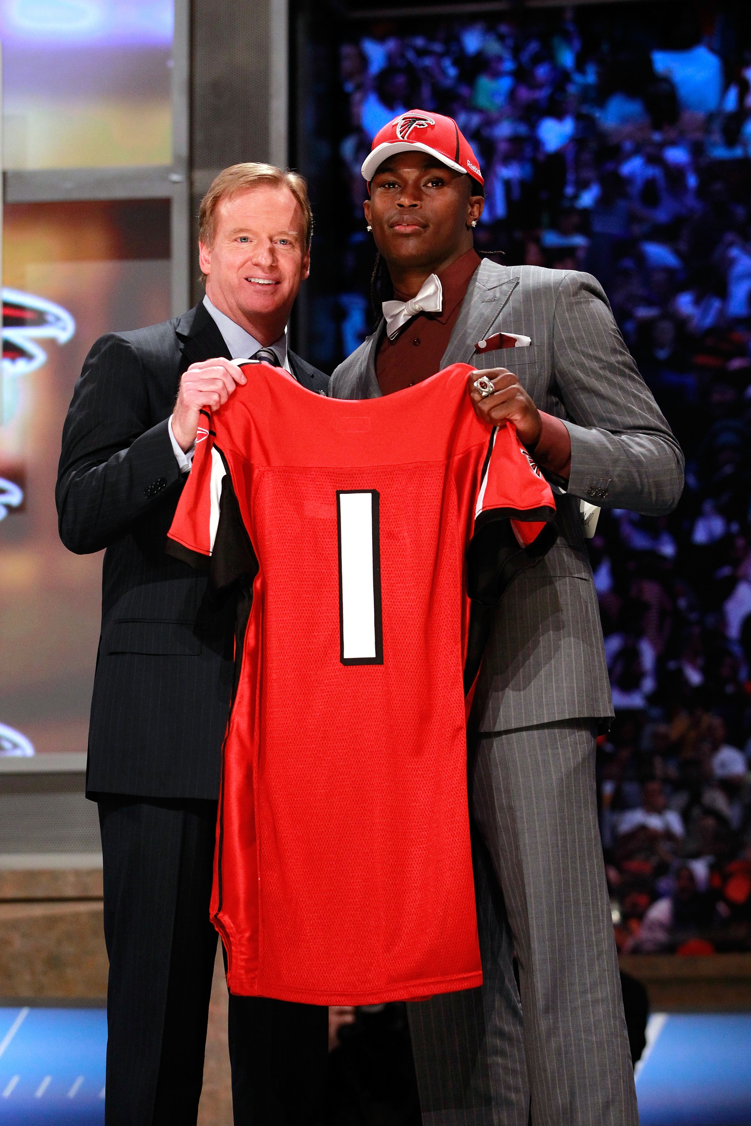 NEW YORK, NY - APRIL 28:  NFL Commissioner Roger Goodell (L) poses for a photo with Julio Jones, #6 overall pick by the Atlanta Falcons, holds up a jersey on stage during the 2011 NFL Draft at Radio City Music Hall on April 28, 2011 in New York City.  (Ph