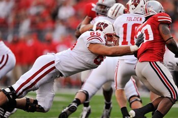 COLUMBUS, OH - OCTOBER 10:  Offensive lineman Gabe Carimi #68 of the Wisconsin Badgers blocks against the Ohio State Buckeyes at Ohio Stadium on October 10, 2009 in Columbus, Ohio.  (Photo by Jamie Sabau/Getty Images)