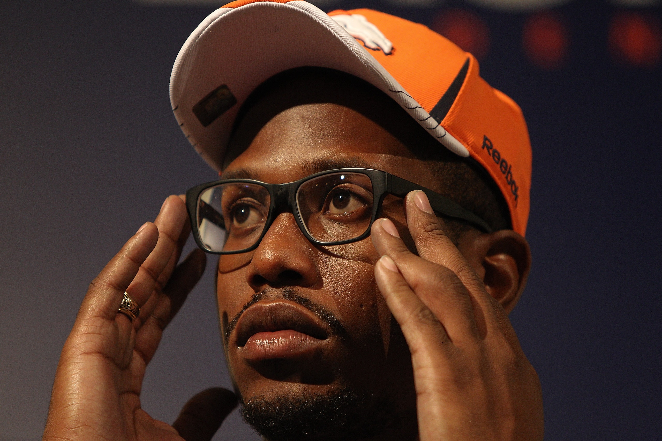 ENGLEWOOD, CO - APRIL 29: Von Miller of the Denver Broncos adjusts his glasses while speaking to the media at Dove Valley on April 29, 2011 in Englewood, Colorado. Miller, a projected outside linebacker in head coach John Fox's new 4-3 scheme, was select ENGLEWOOD, CO - APRIL 29: Von Miller of the Denver Broncos adjusts his glasses while speaking to the media at Dove Valley on April 29, 2011 in Englewood, Colorado. Miller, a projected outside linebacker in head coach John Fox's new 4-3 scheme, was select