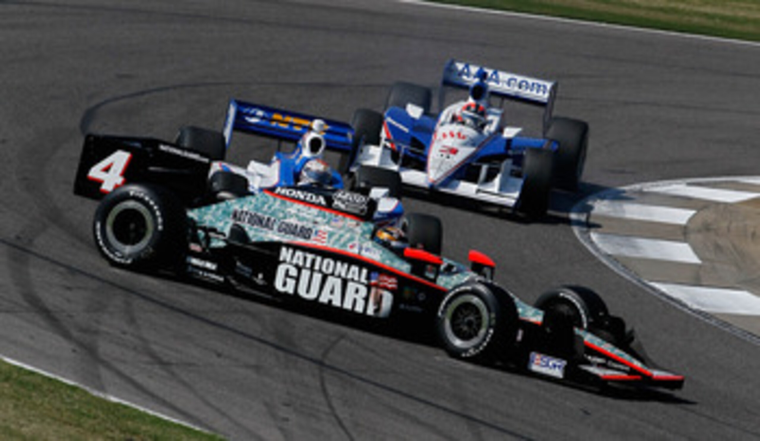 BIRMINGHAM, AL - APRIL 10:  JR Hildebrand, driver of the #4 Panther Racing Dallara Honda, spins in front of Graham Rahal, driver of the #38 Service Central Chip Ganassi Racing Dallara Honda, and Helio Castroneves of Brazil, driver of the #3 Team Penske Da