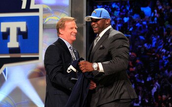 NEW YORK, NY - APRIL 28:  NFL Commissioner Roger Goodell (L) greets Corey Liuget, #18 overall pick by the San Diego Chargers, on stage during the 2011 NFL Draft at Radio City Music Hall on April 28, 2011 in New York City.  (Photo by Chris Trotman/Getty Im