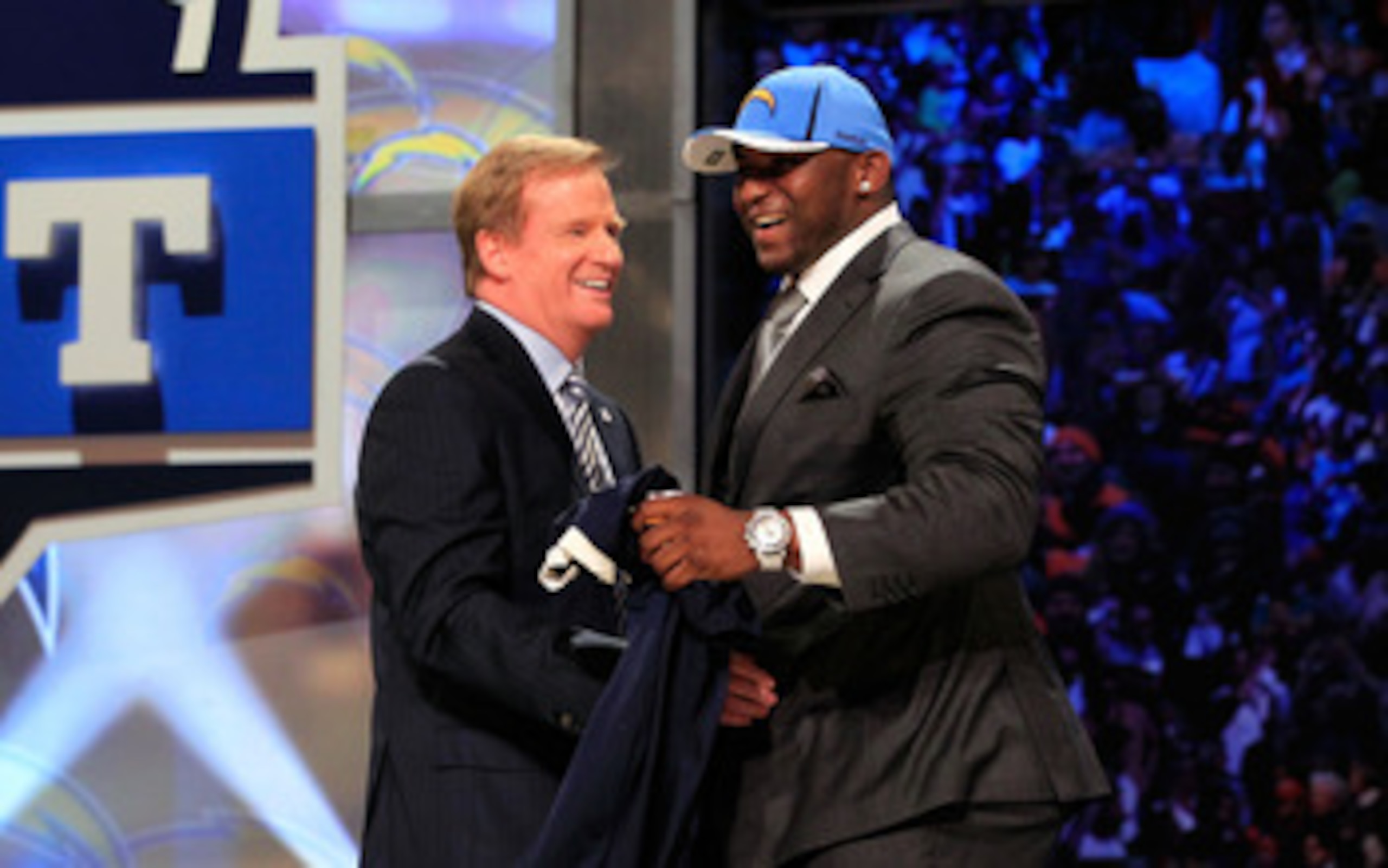 NEW YORK, NY - APRIL 28:  NFL Commissioner Roger Goodell (L) greets Corey Liuget, #18 overall pick by the San Diego Chargers, on stage during the 2011 NFL Draft at Radio City Music Hall on April 28, 2011 in New York City.  (Photo by Chris Trotman/Getty Im
