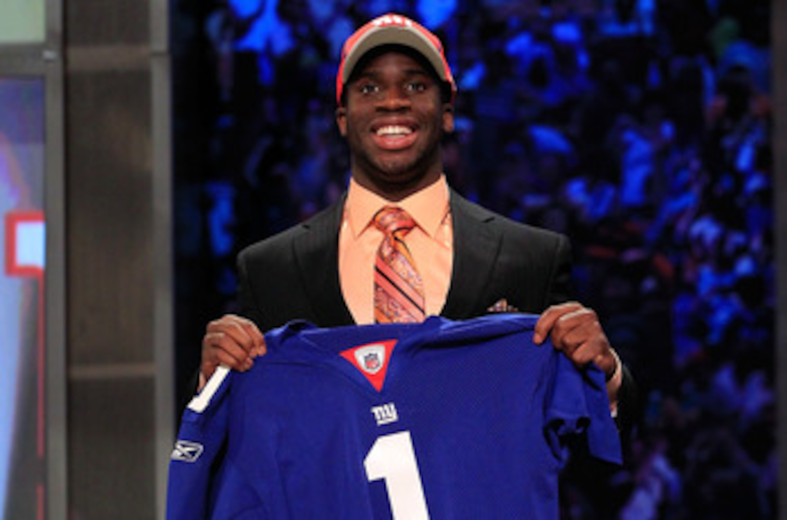 NEW YORK, NY - APRIL 28:  Prince Amukamara, #19 overall pick by the New York Giants, holds up a jersey on stage during the 2011 NFL Draft at Radio City Music Hall on April 28, 2011 in New York City.  (Photo by Chris Trotman/Getty Images)